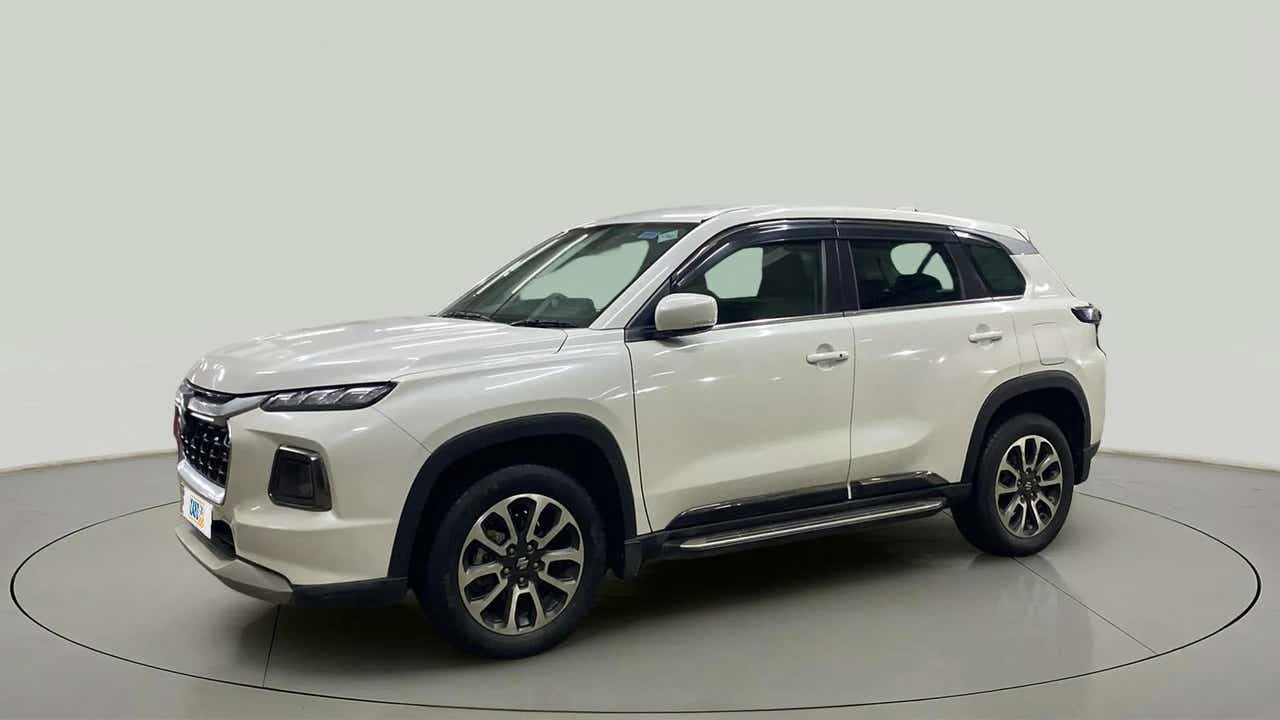 Front and side view of a Splendid Silver Maruti Suzuki Grand Vitara