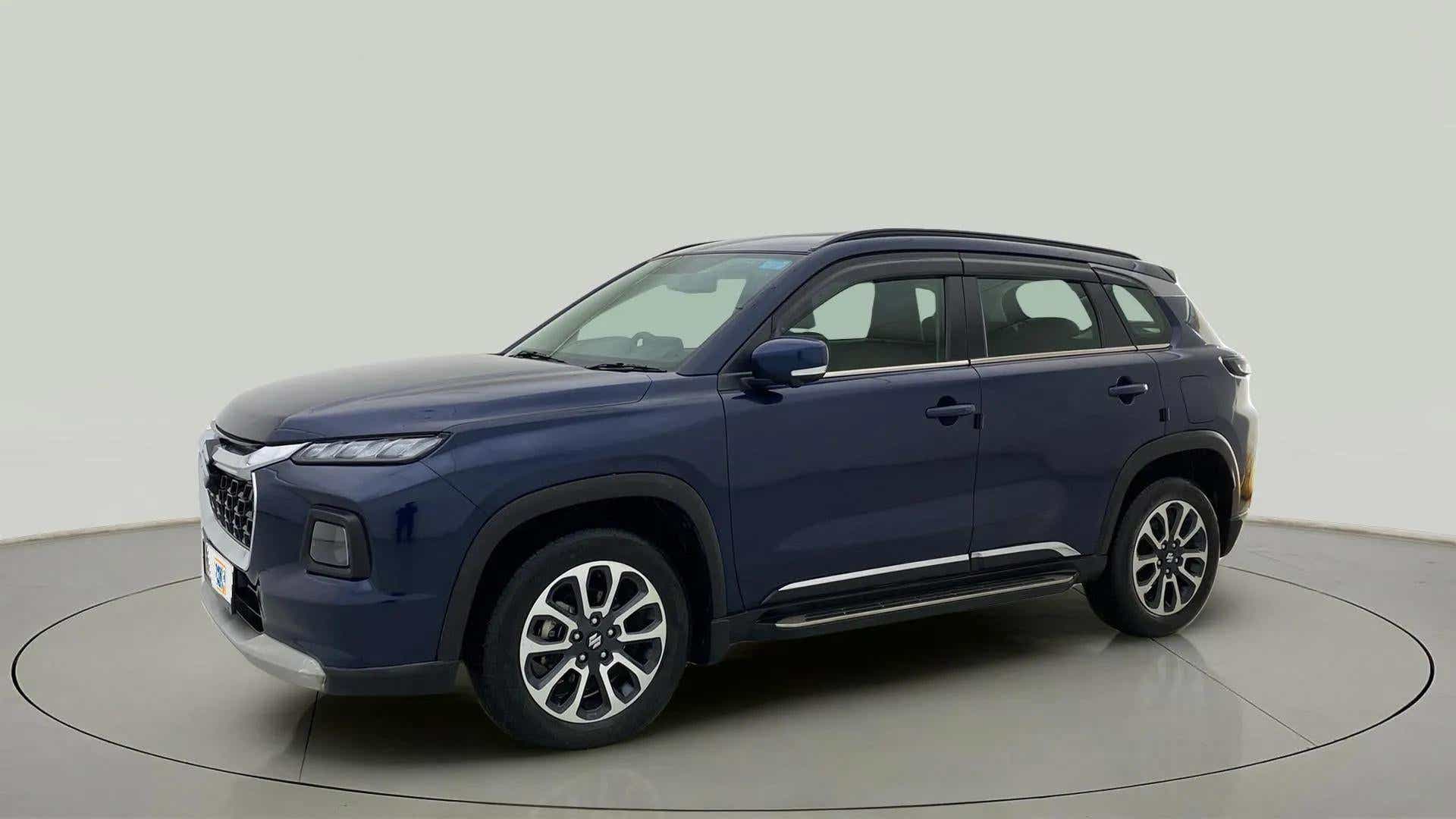 Front three-quarter view of a Nexa Blue Maruti Suzuki Grand Vitara