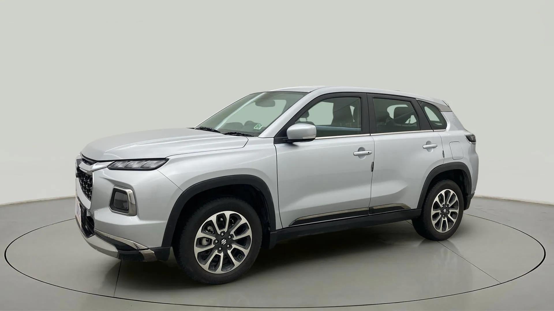 Front-side view of a Splendid Silver Maruti Suzuki Grand Vitara