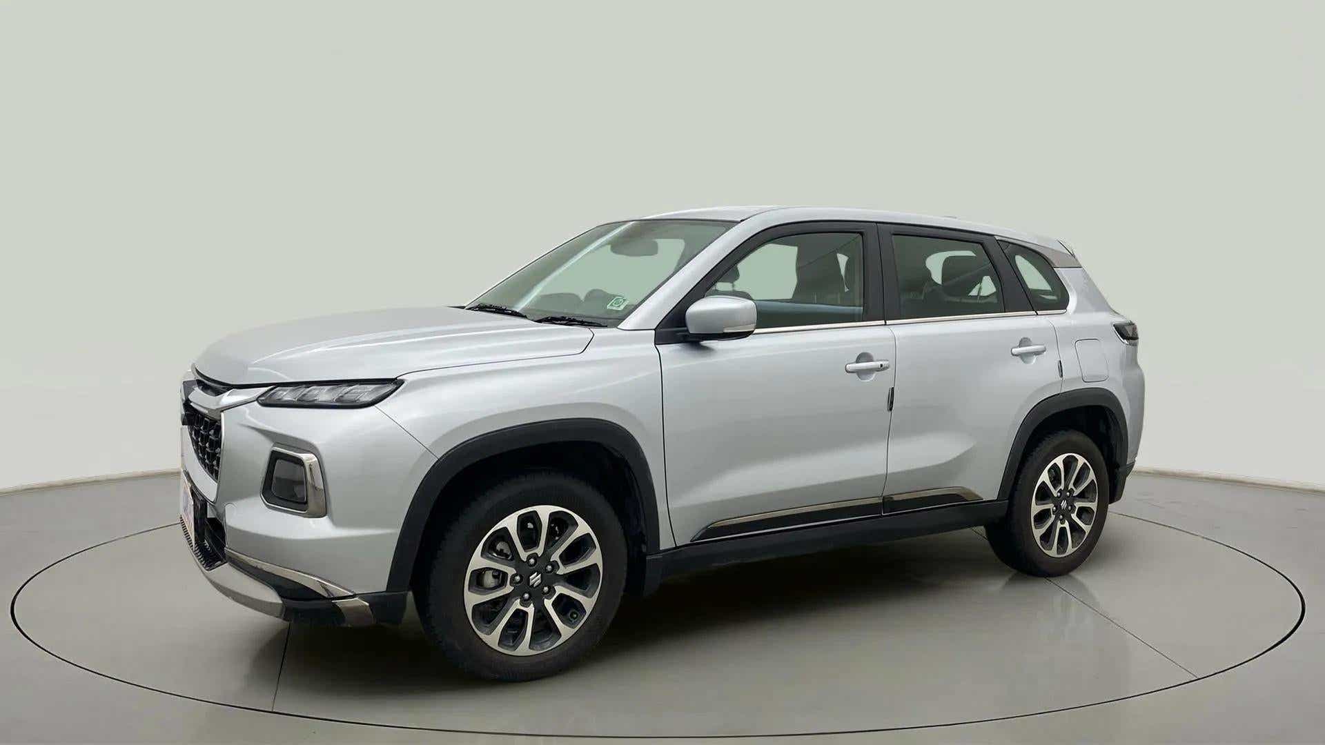 Front-side view of a Splendid Silver Maruti Suzuki Grand Vitara