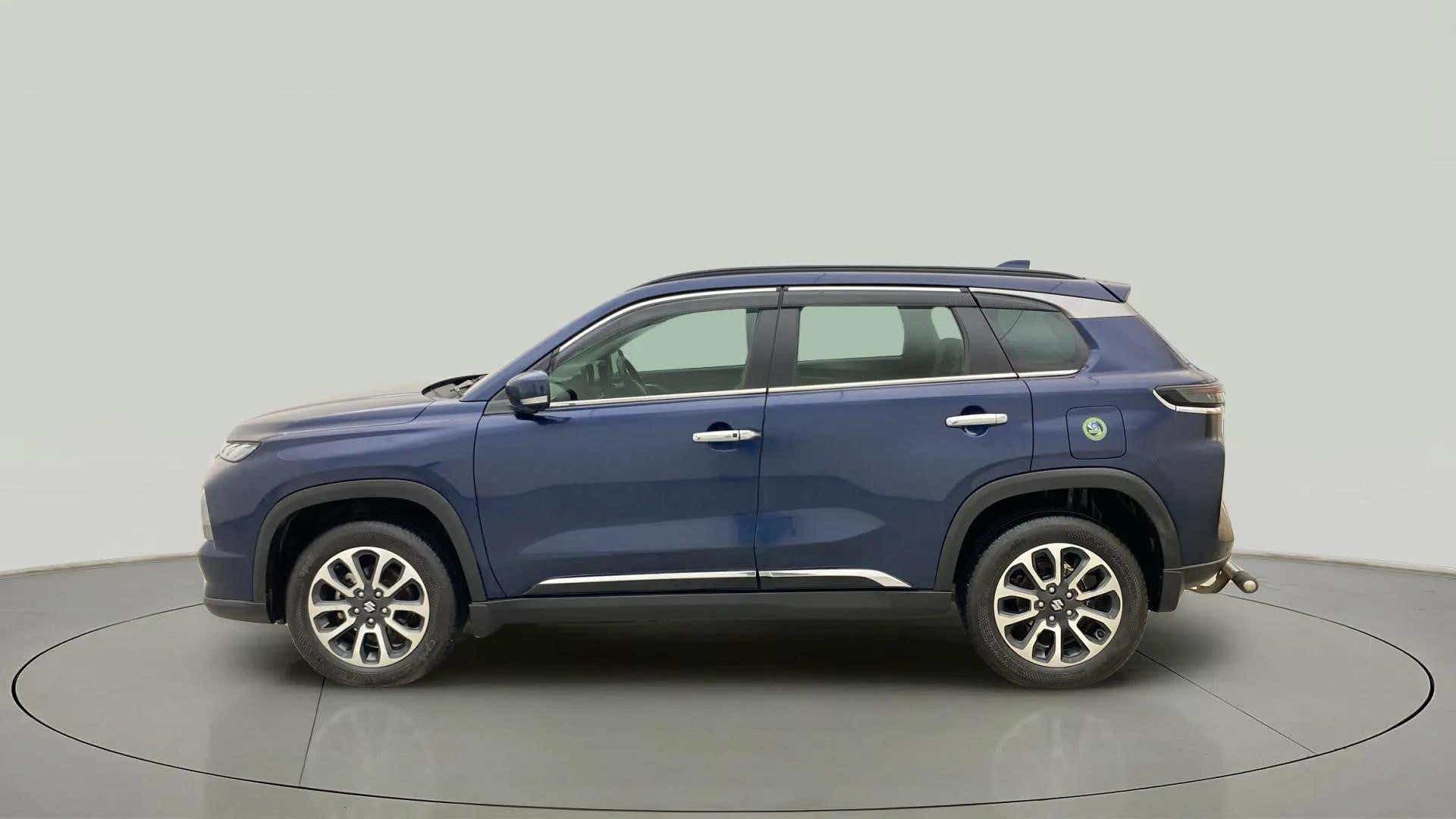 Side view of a Nexa Blue Maruti Suzuki Grand Vitara