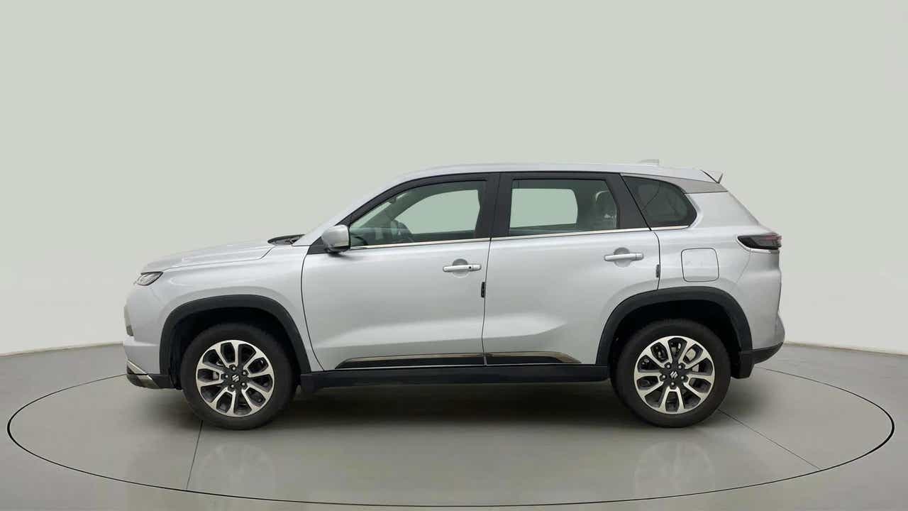 Side view of a Splendid Silver Maruti Suzuki Grand Vitara