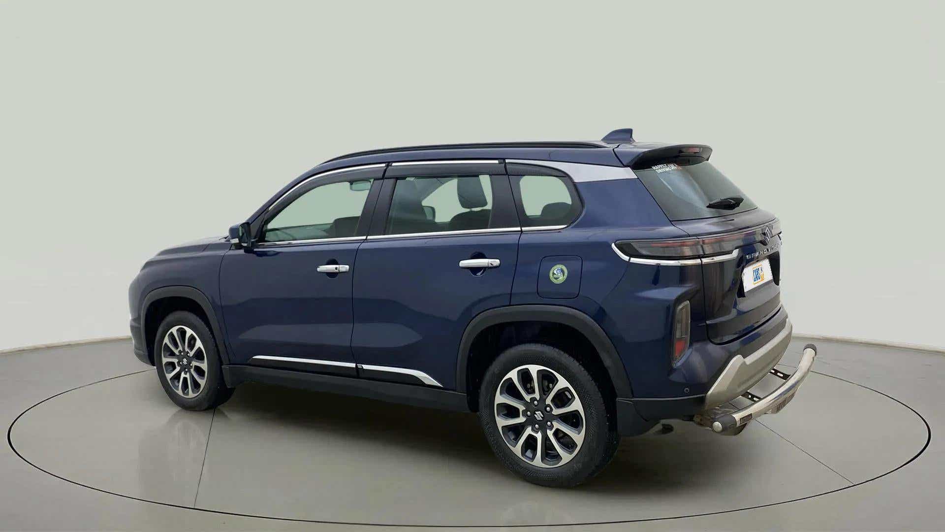 Rear three quarter of a Nexa Blue Maruti Suzuki Grand Vitara
