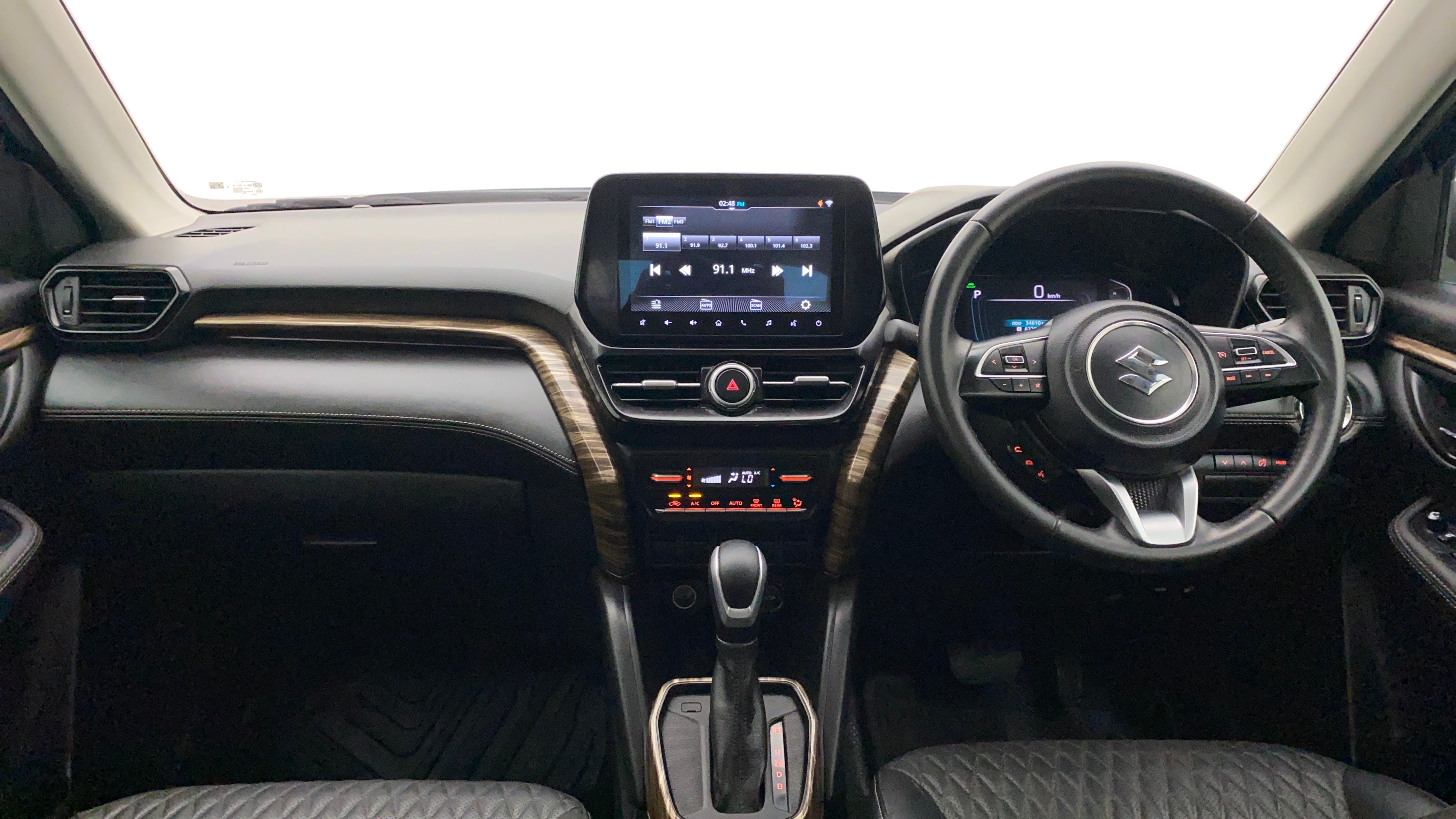 Interior dashboard view of a Maruti Suzuki Grand Vitara