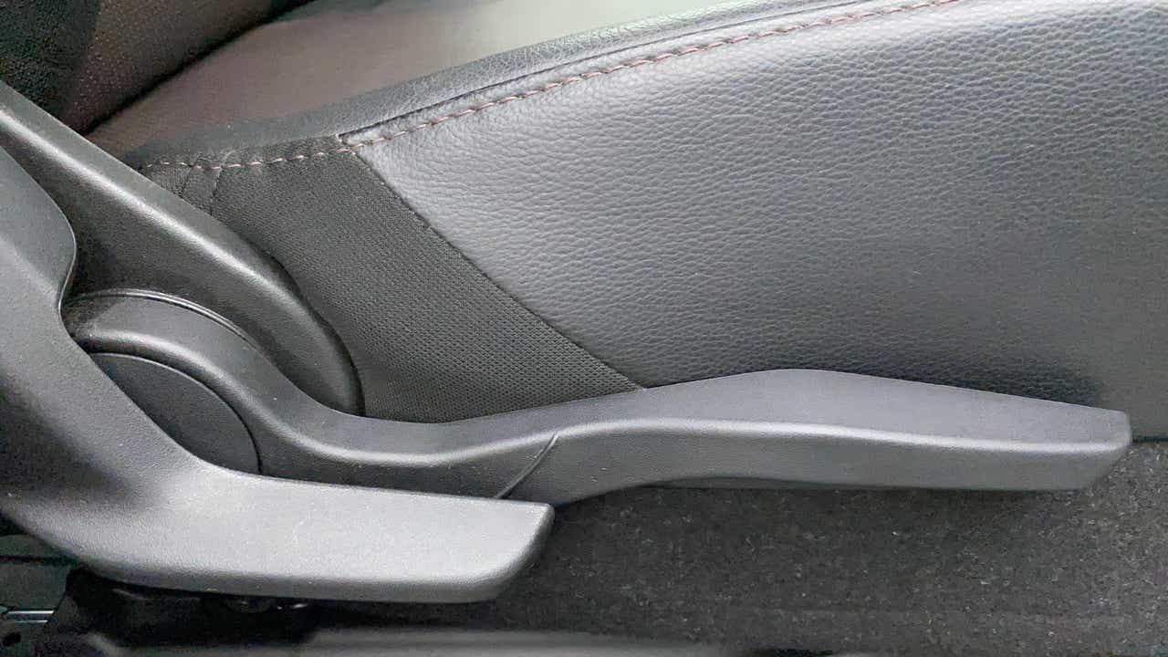Side seat adjuster lever of a Maruti Suzuki Grand Vitara