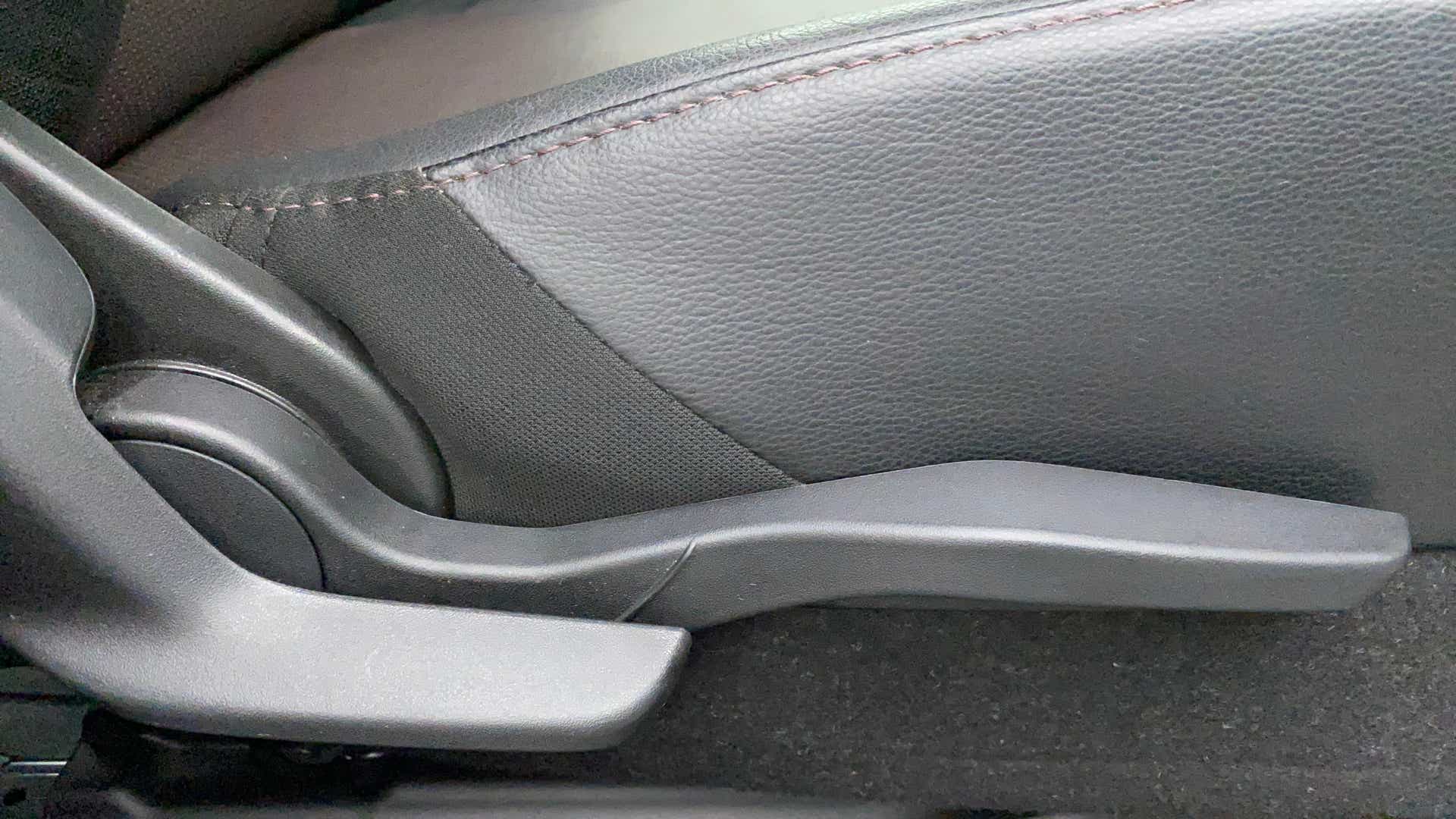 Side seat adjuster lever of a Maruti Suzuki Grand Vitara