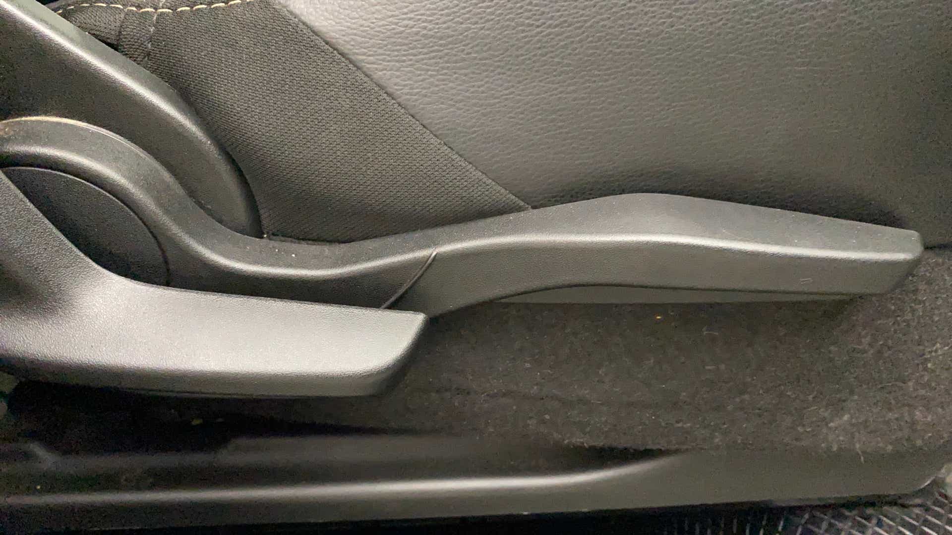Manual seat adjustment lever of a Maruti Suzuki Grand Vitara