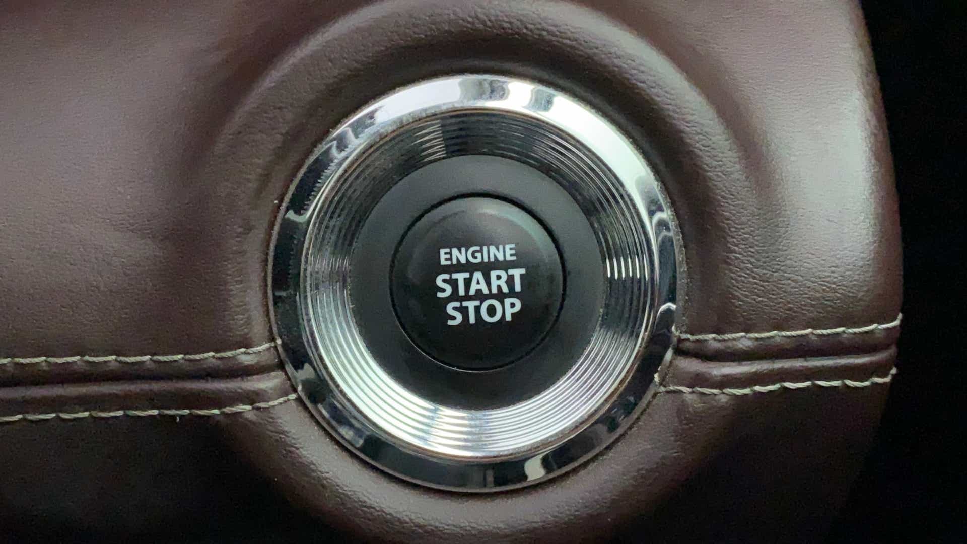 Close-up of engine start stop button in a Maruti Suzuki Grand Vitara