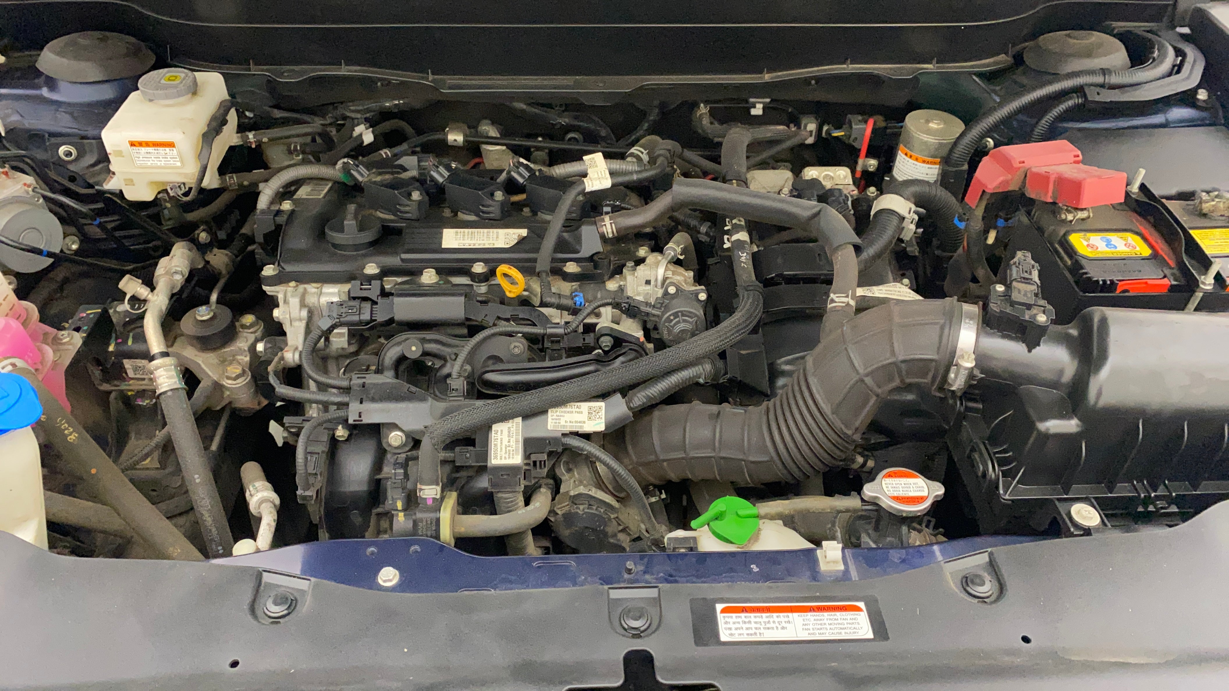 Engine bay of a Maruti Suzuki Grand Vitara