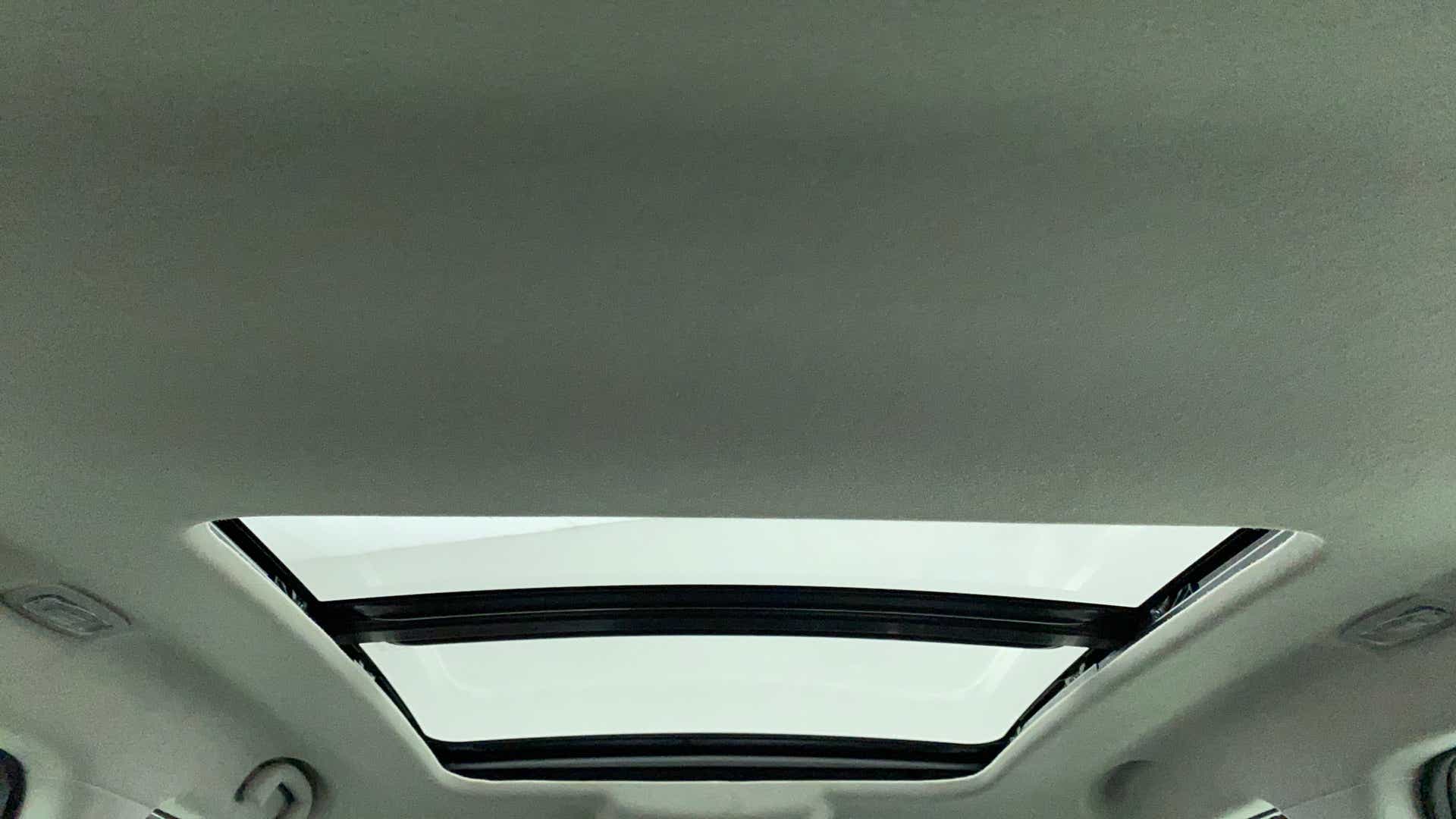 Sunroof interior view of a Maruti Suzuki Grand Vitara