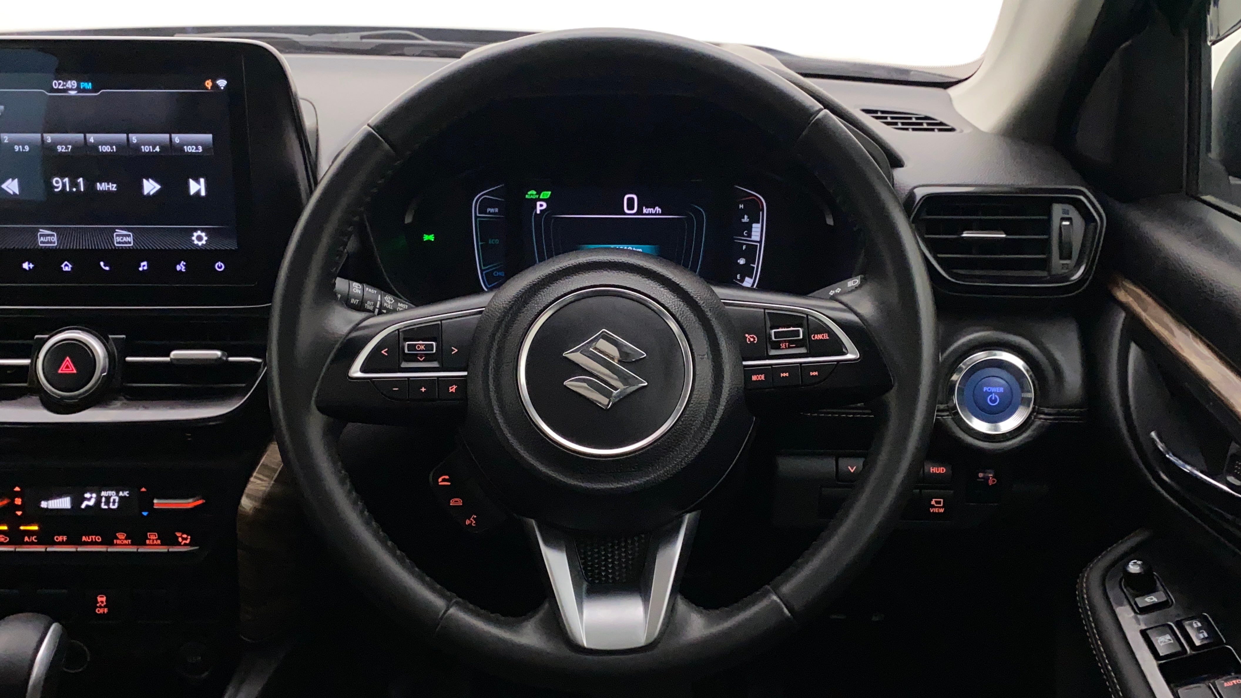 Steering wheel and dashboard of a Maruti Suzuki Grand Vitara