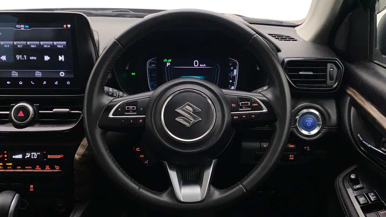 Steering wheel and dashboard of a Maruti Suzuki Grand Vitara