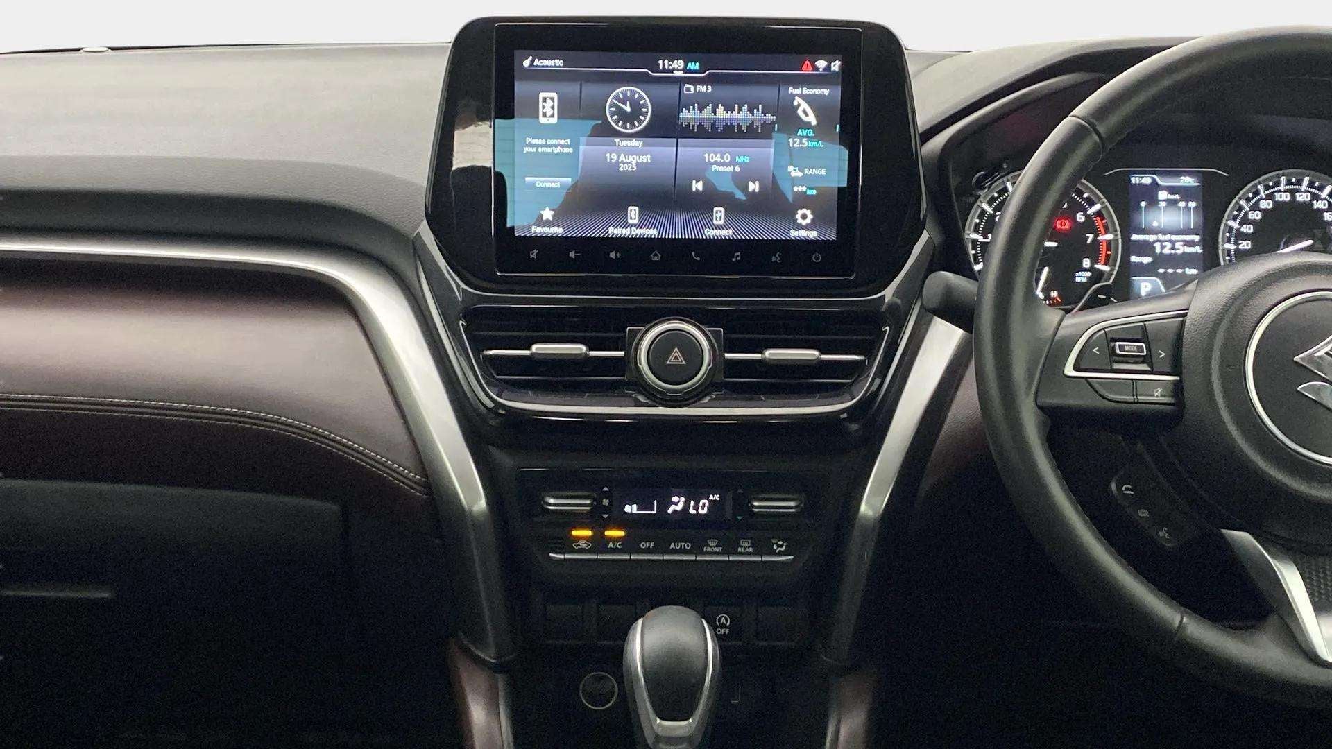 Interior dashboard view of a Maruti Suzuki Grand Vitara