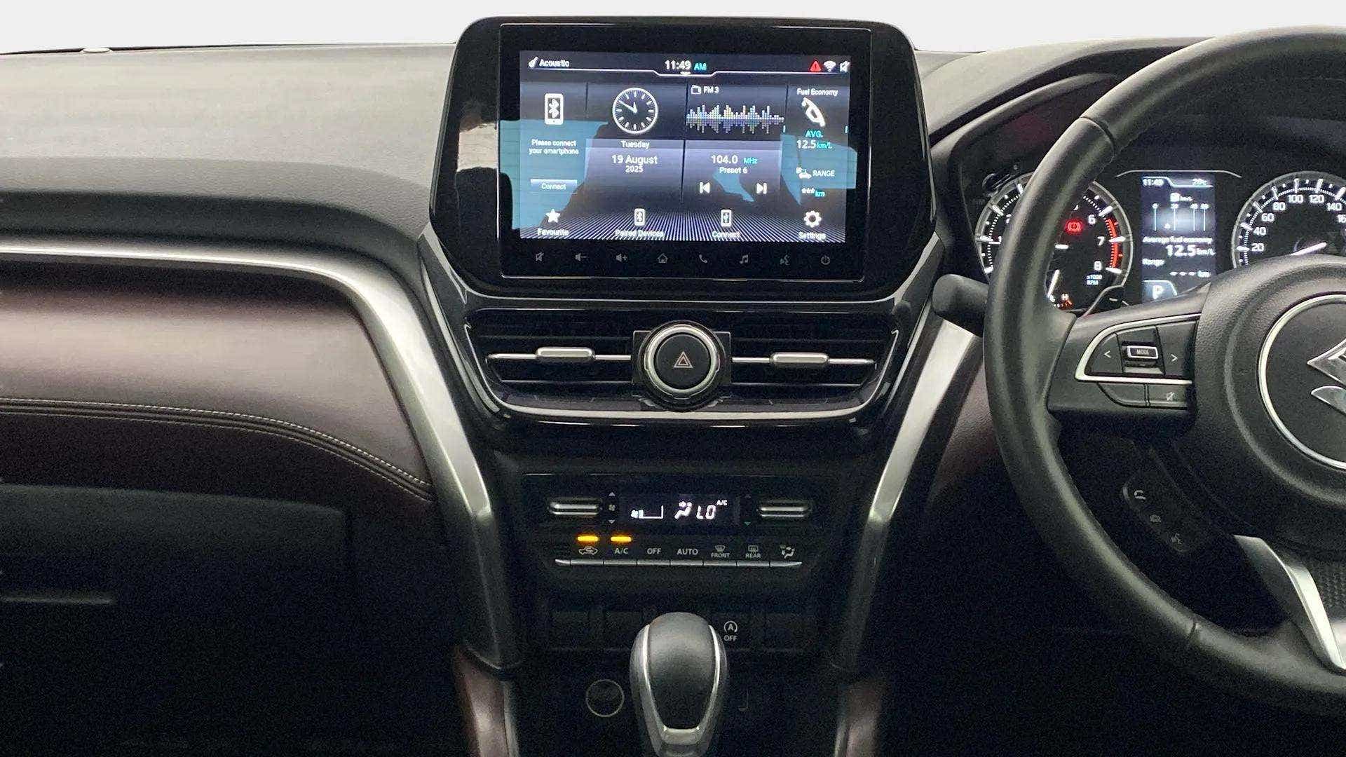 Interior dashboard view of a Maruti Suzuki Grand Vitara