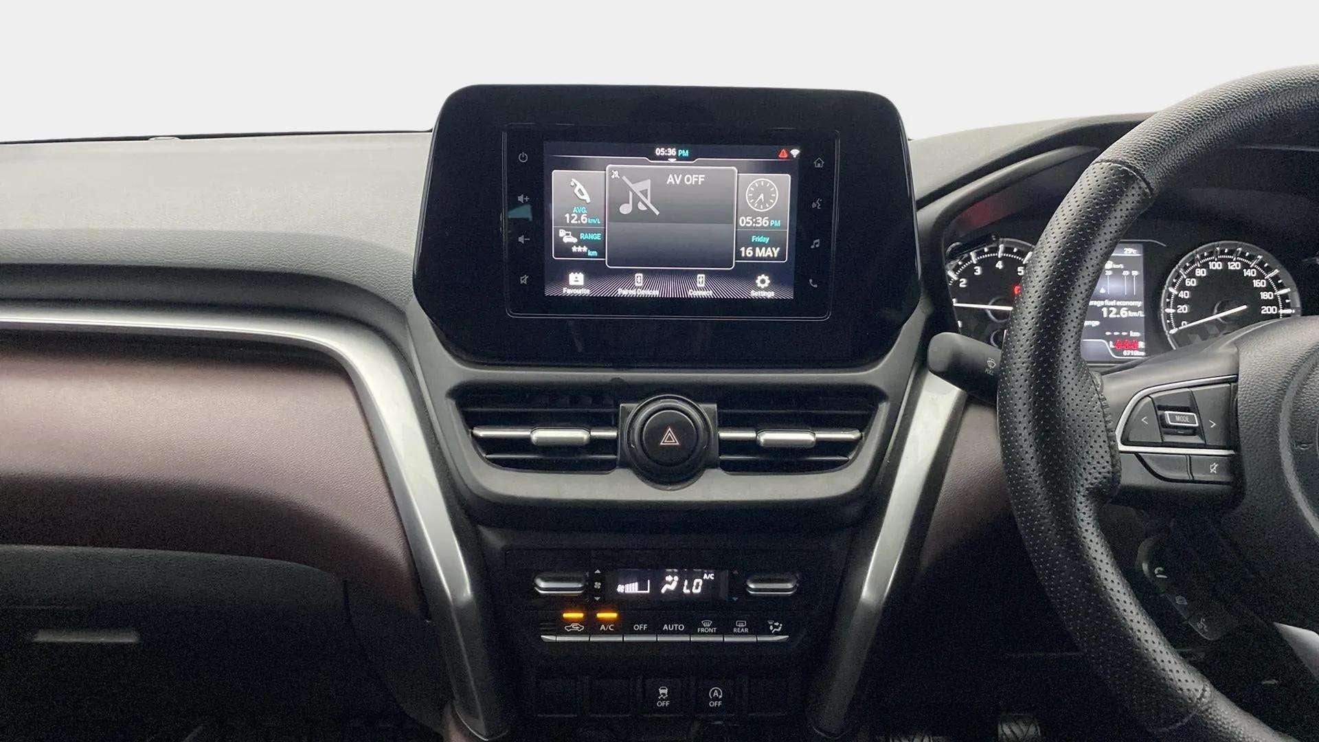 Dashboard and steering view of a Maruti Suzuki Grand Vitara
