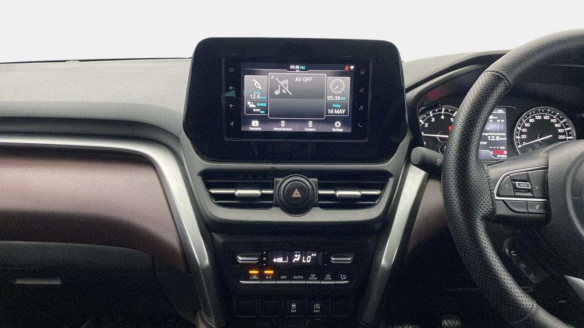 Dashboard and steering view of a Maruti Suzuki Grand Vitara