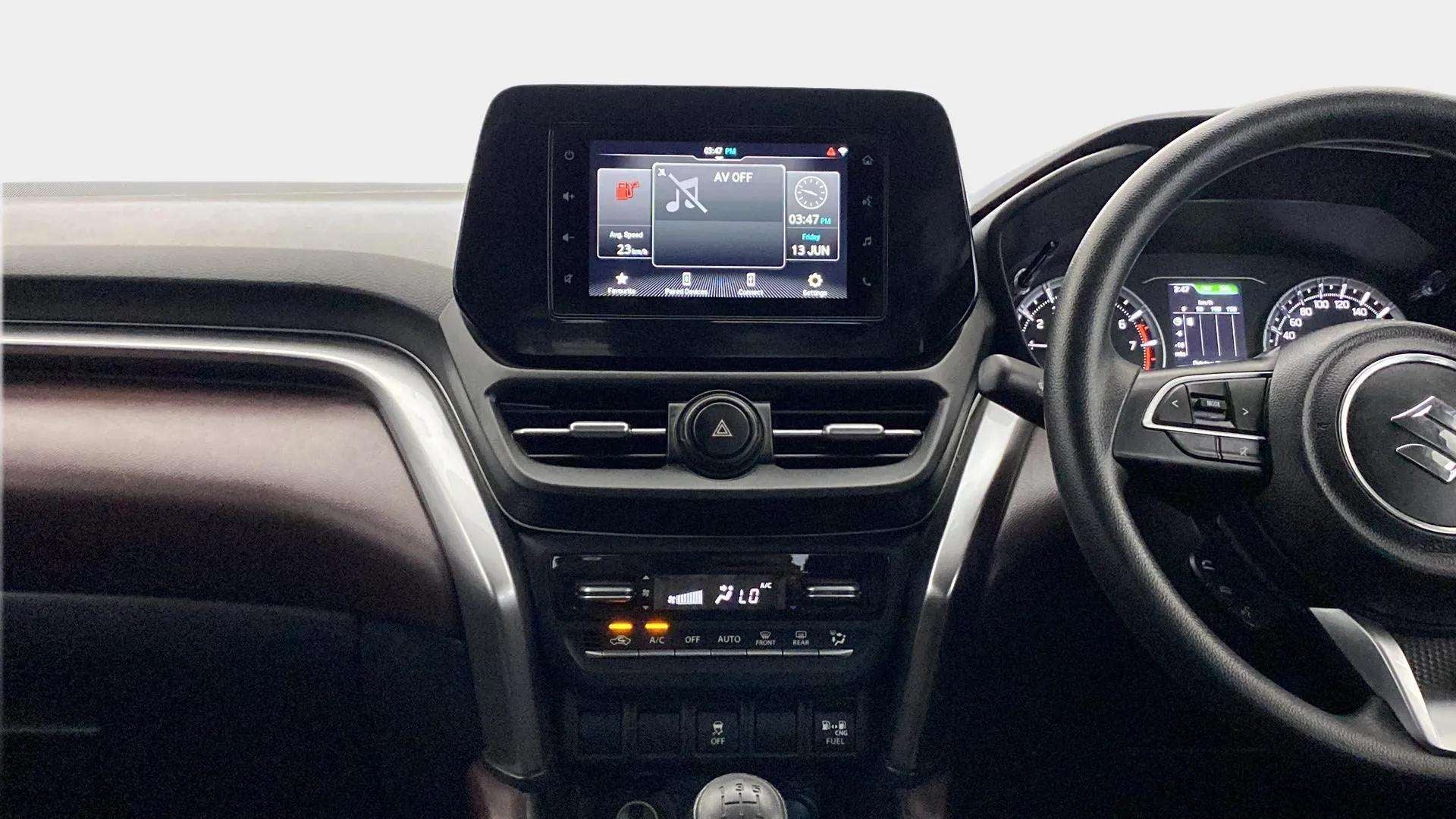 Dashboard and steering wheel of a Maruti Suzuki Grand Vitara