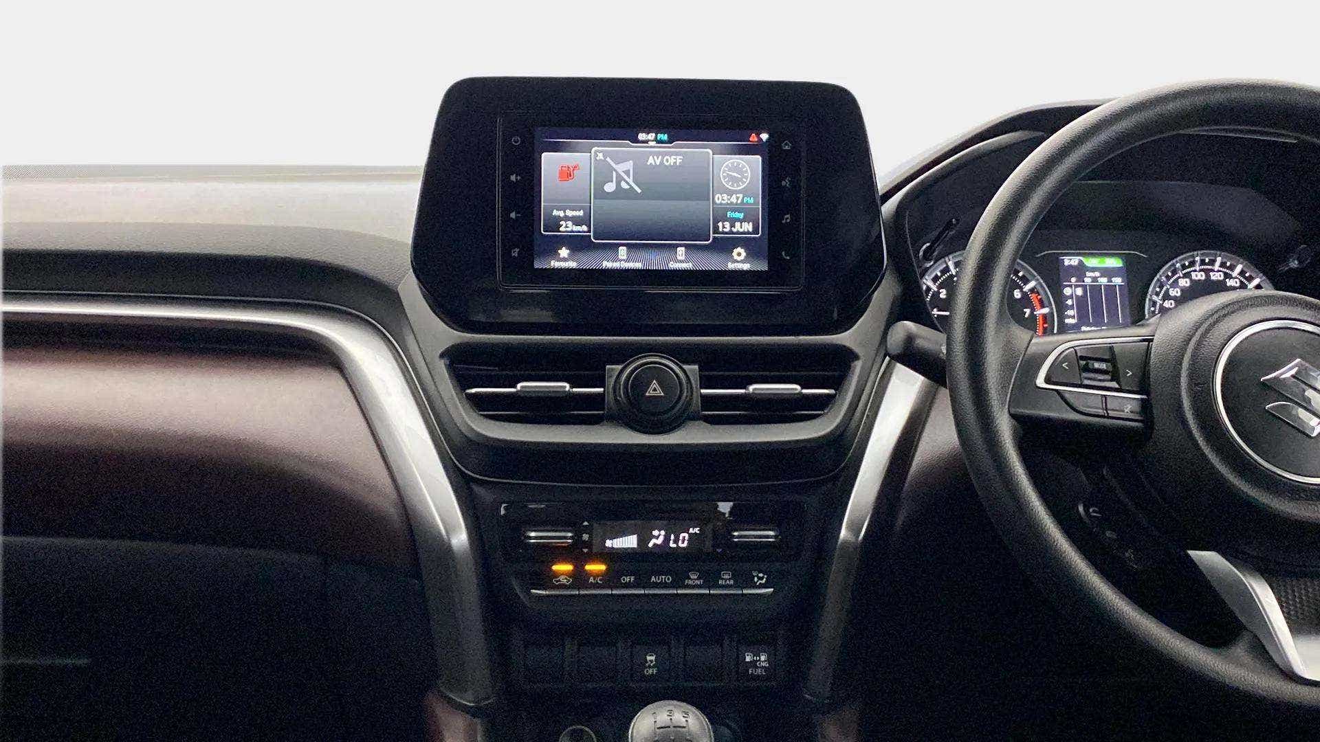 Dashboard and steering wheel of a Maruti Suzuki Grand Vitara