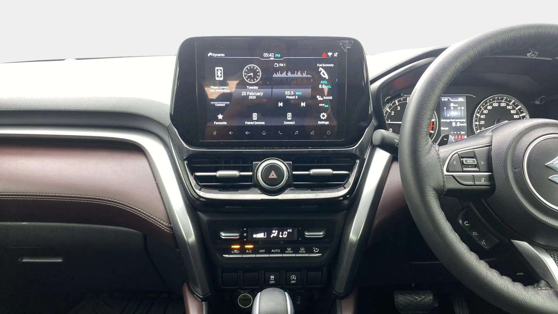 Dashboard and infotainment system of a Maruti Suzuki Grand Vitara