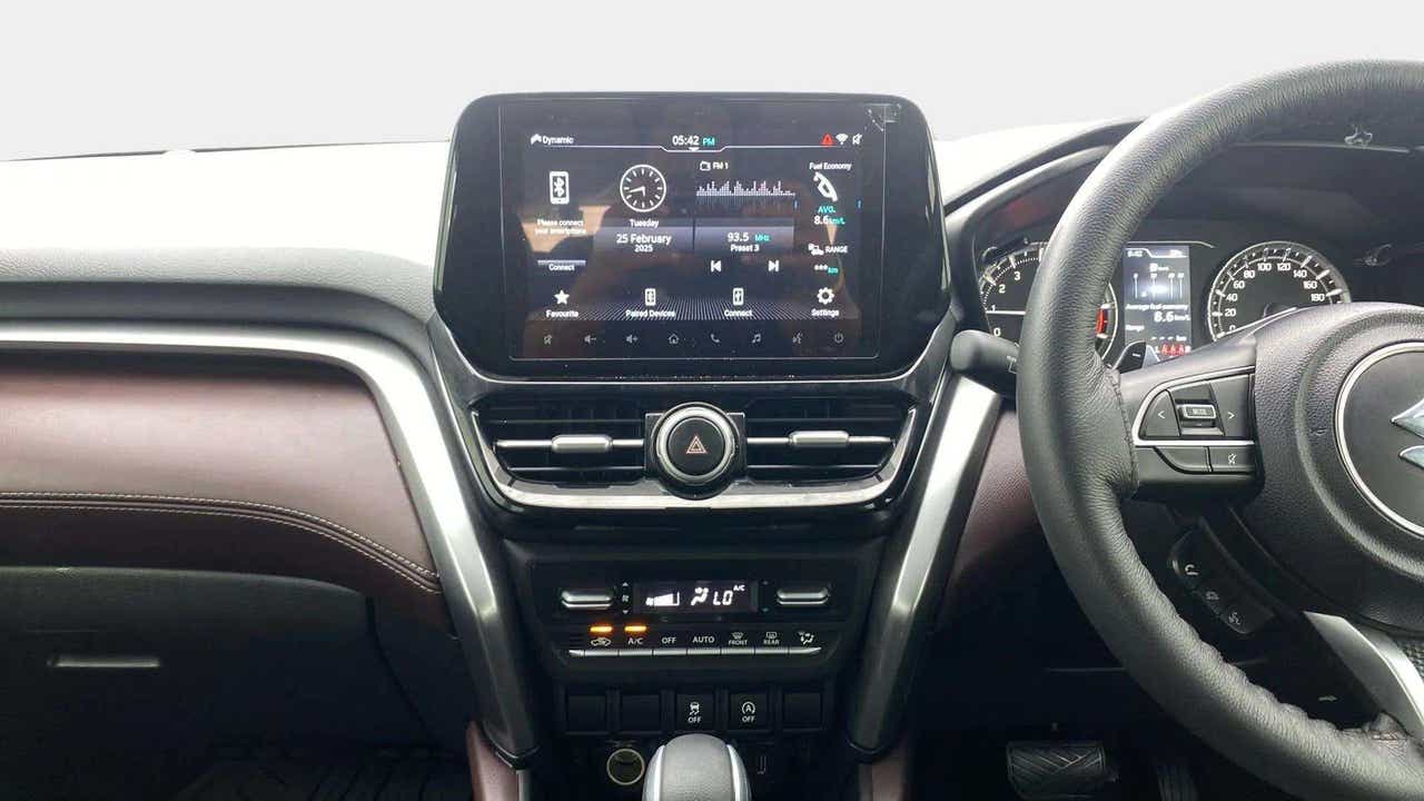 Dashboard and infotainment system of a Maruti Suzuki Grand Vitara