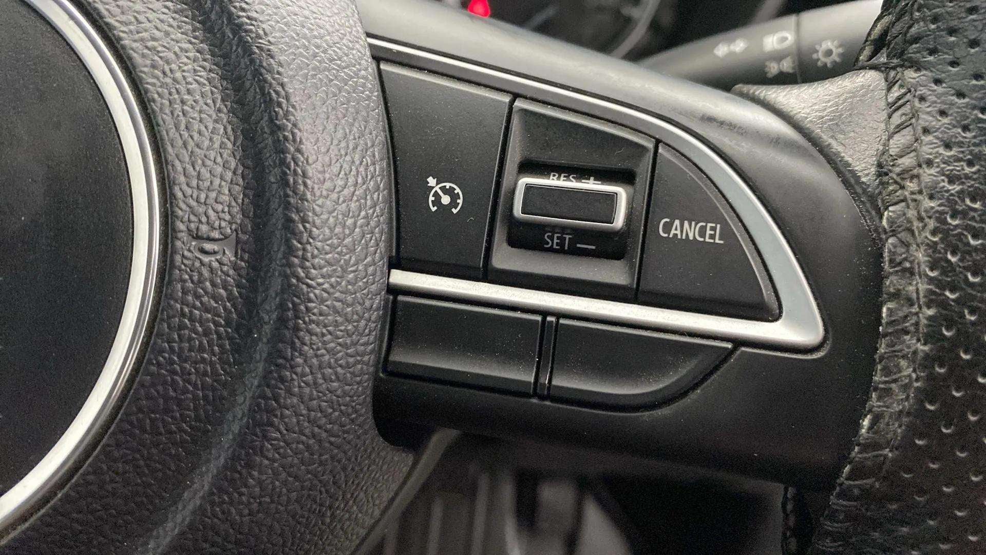 Steering wheel controls of a Maruti Suzuki Grand Vitara