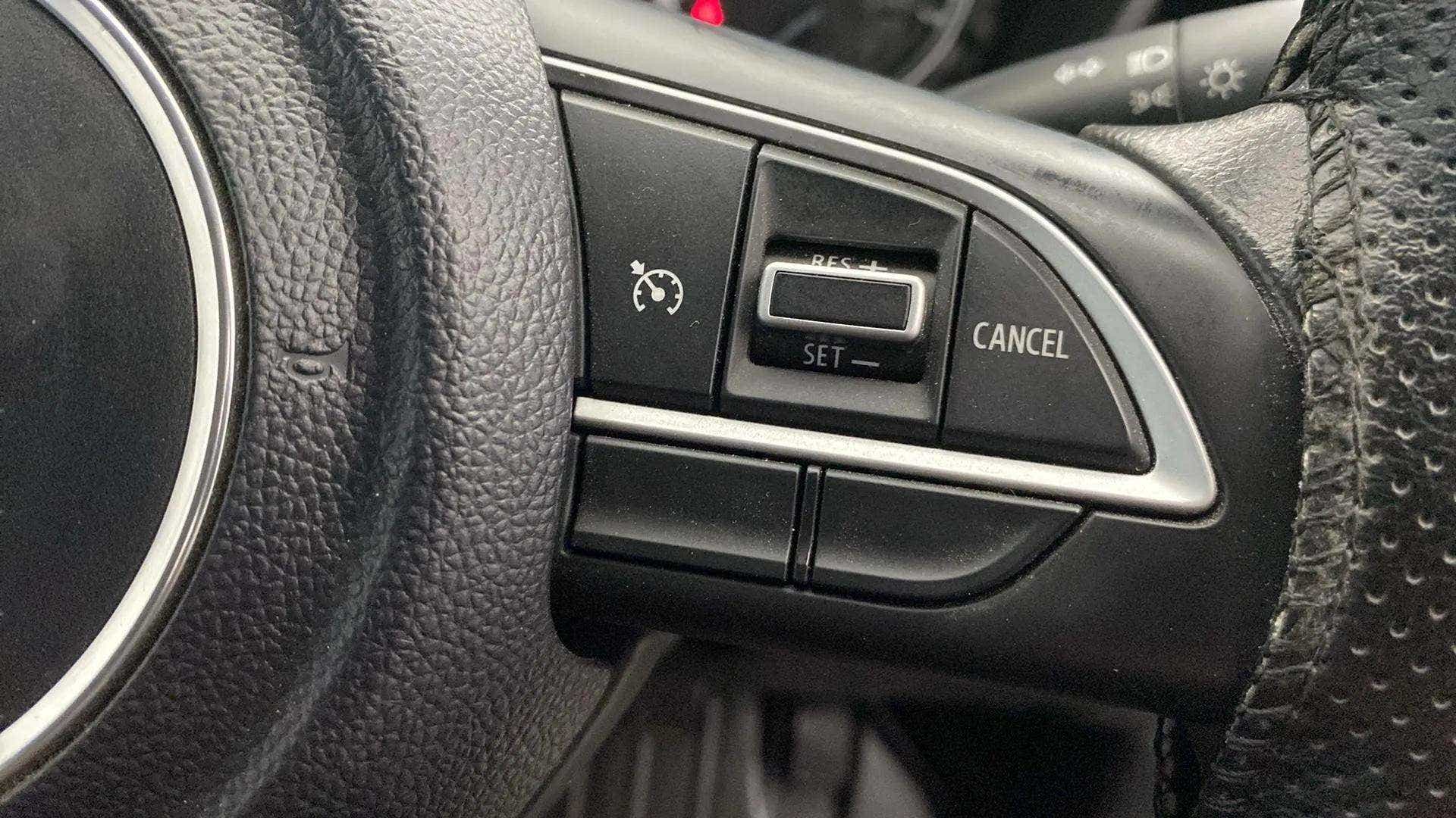 Steering wheel controls of a Maruti Suzuki Grand Vitara