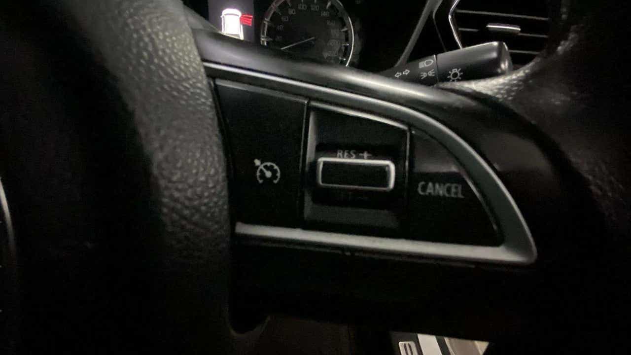 Cruise control button cluster of a Maruti Suzuki Grand Vitara
