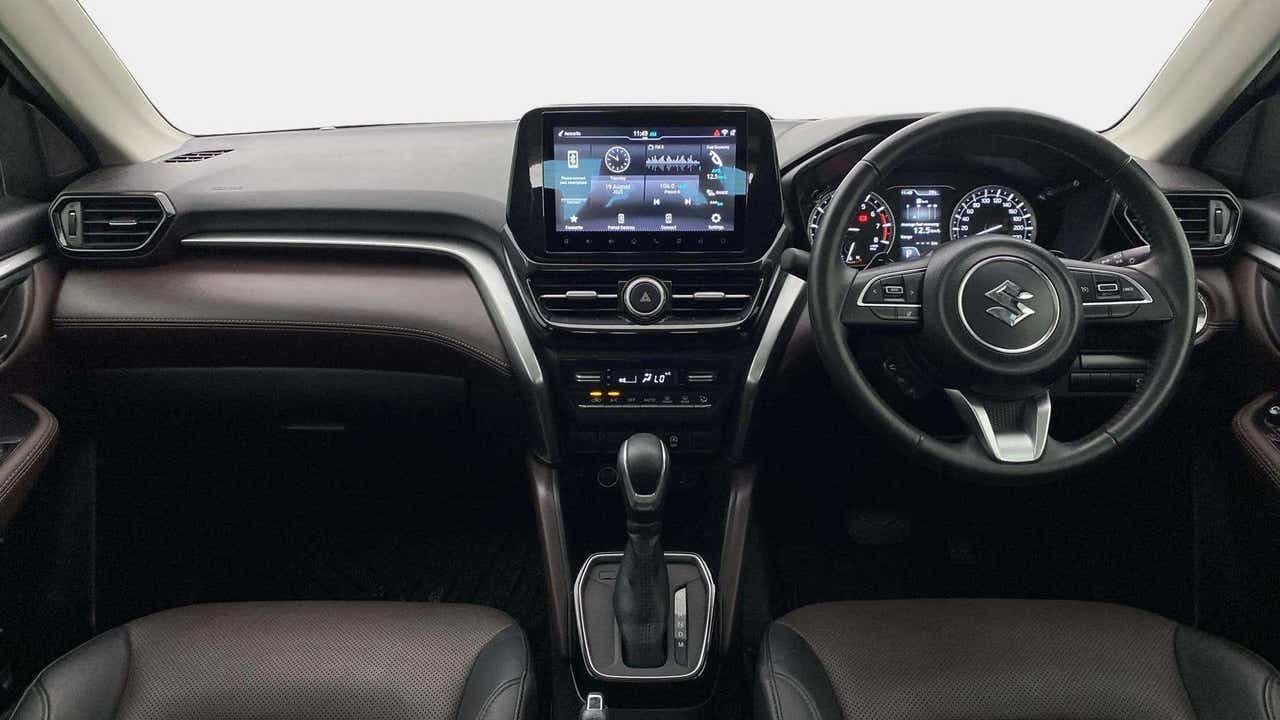 Dashboard and steering wheel of a Maruti Suzuki Grand Vitara