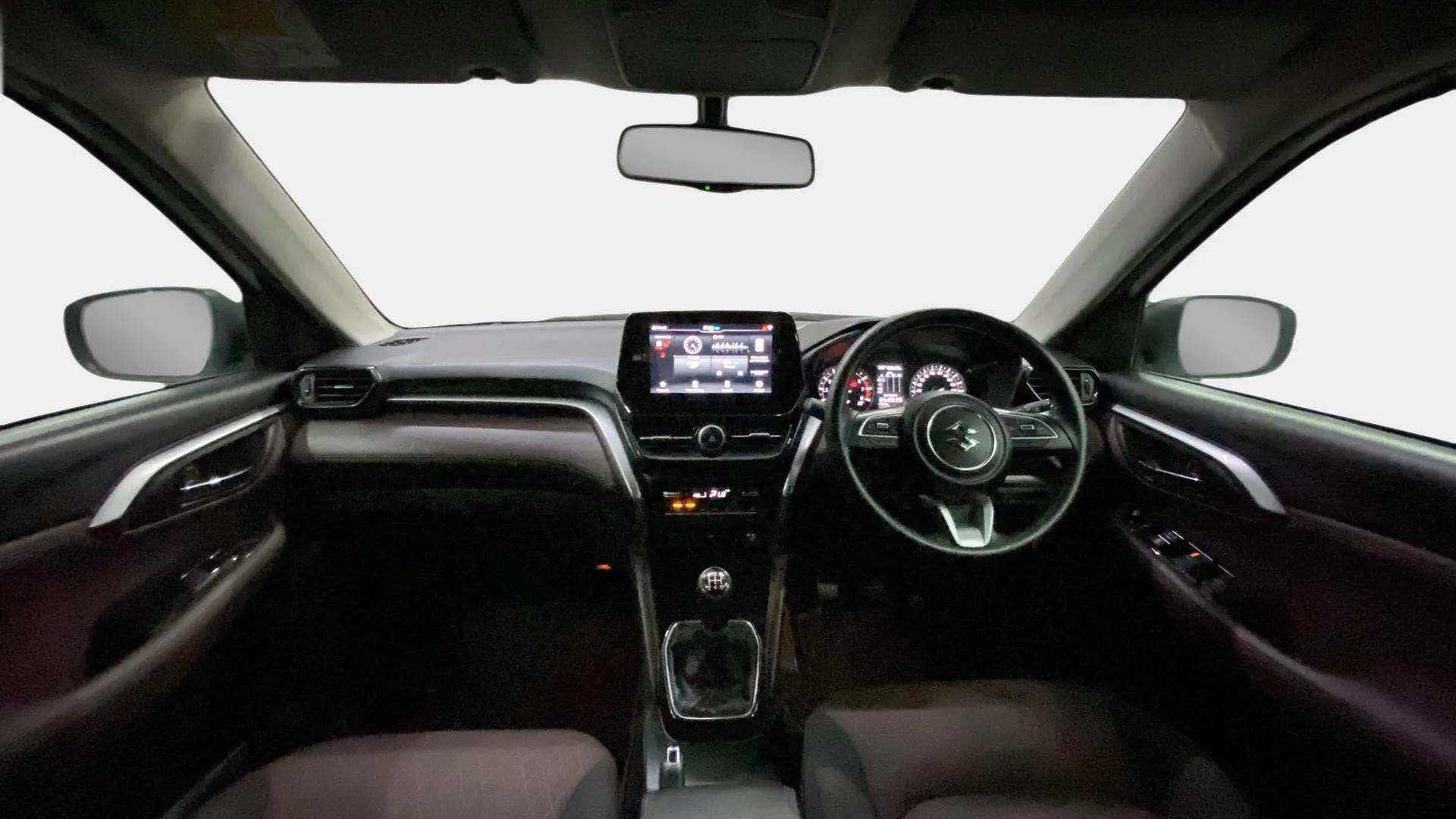 Dashboard and steering wheel of a Maruti Suzuki Grand Vitara