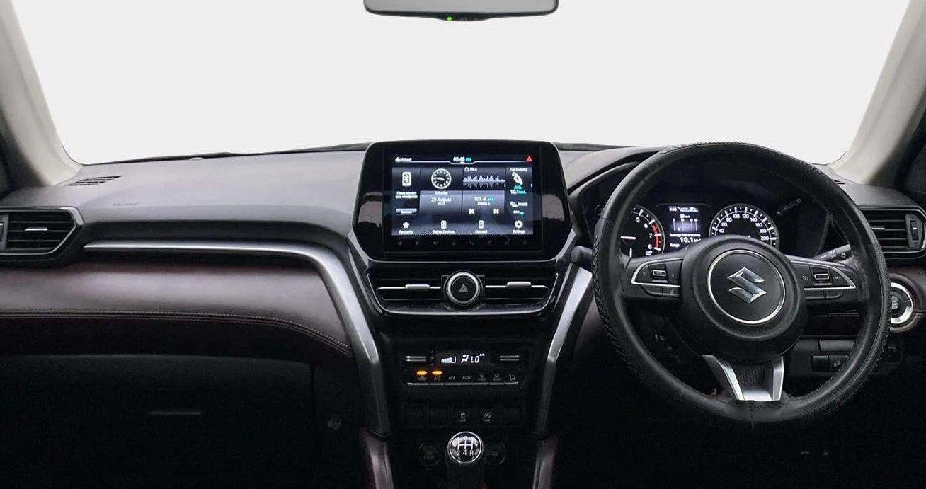 Interior dashboard view of a Maruti Suzuki Grand Vitara