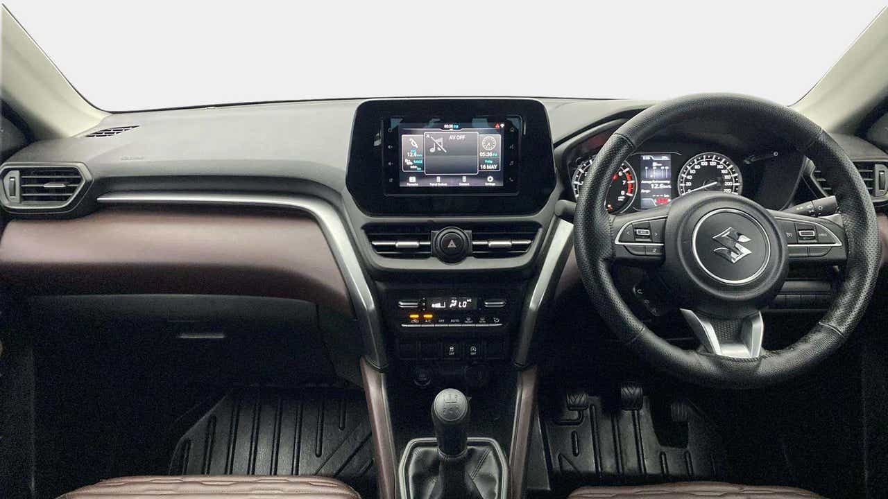 Dashboard and steering wheel of a Maruti Suzuki Grand Vitara