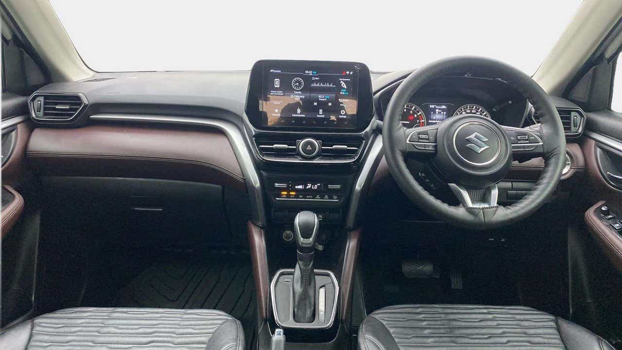 Dashboard and steering view of a Maruti Suzuki Grand Vitara