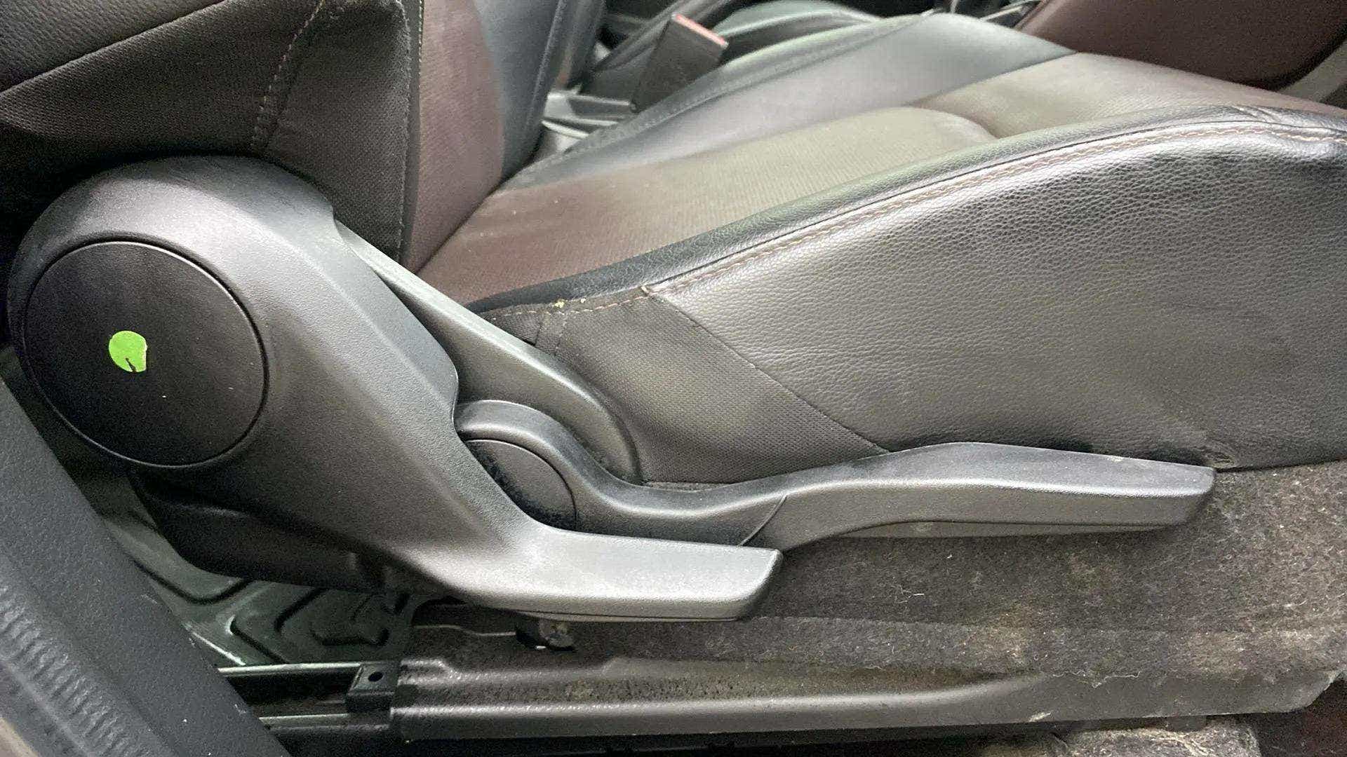 Seat side adjuster of a Maruti Suzuki Grand Vitara