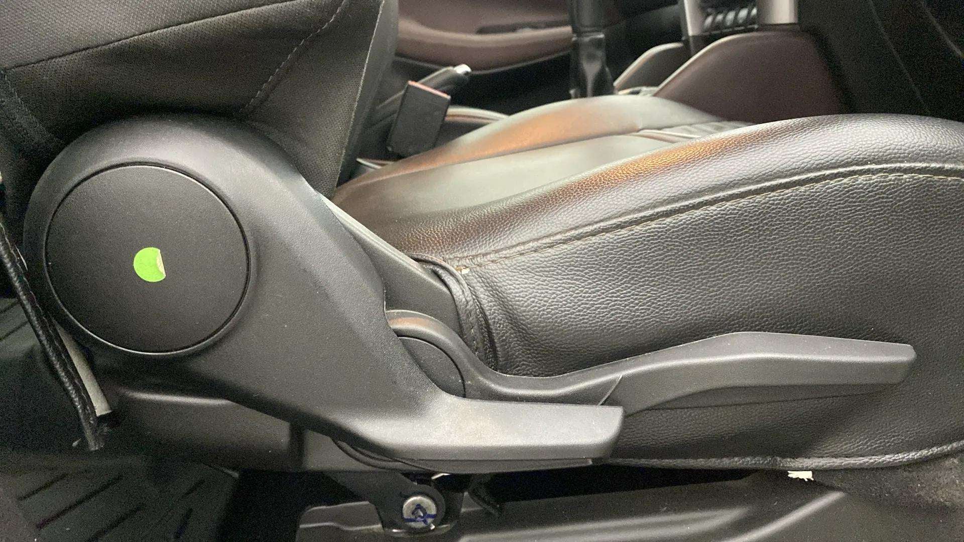 Side seat adjustment lever of a Maruti Suzuki Grand Vitara