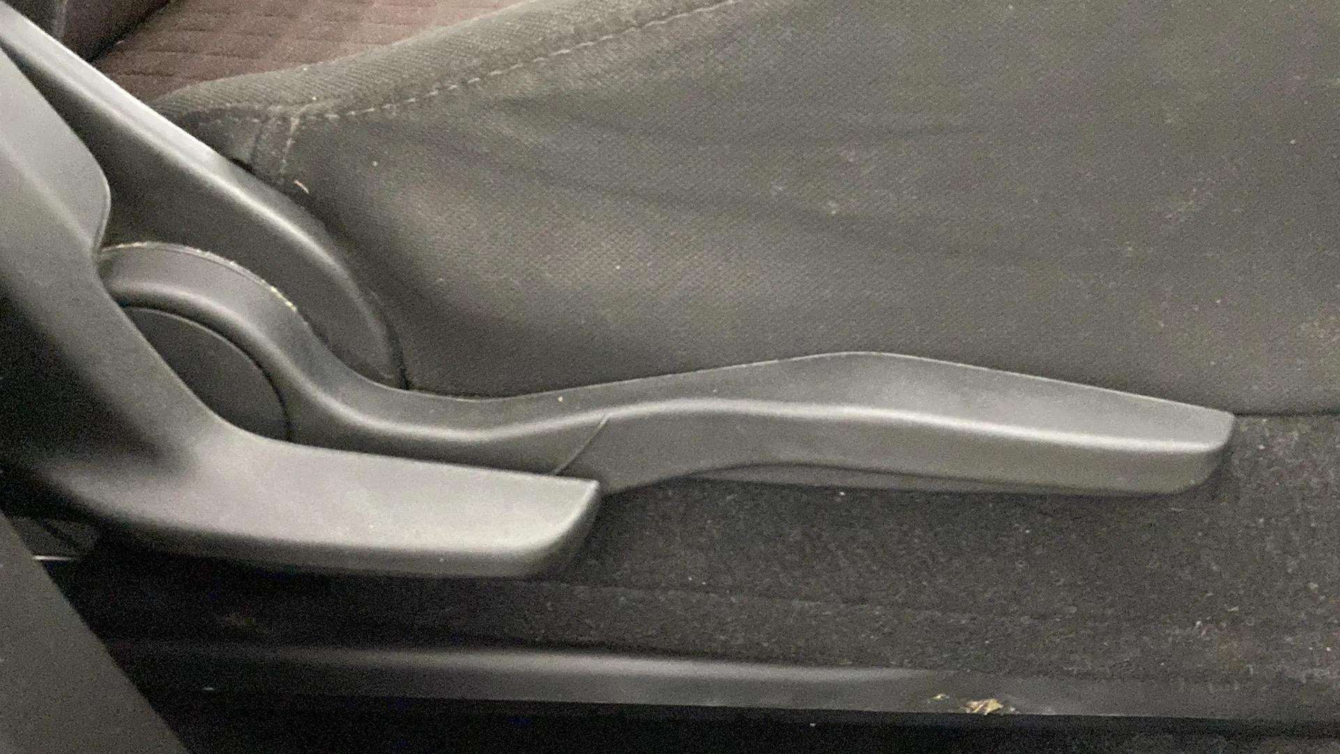 Seat adjustment lever of a Maruti Suzuki Grand Vitara