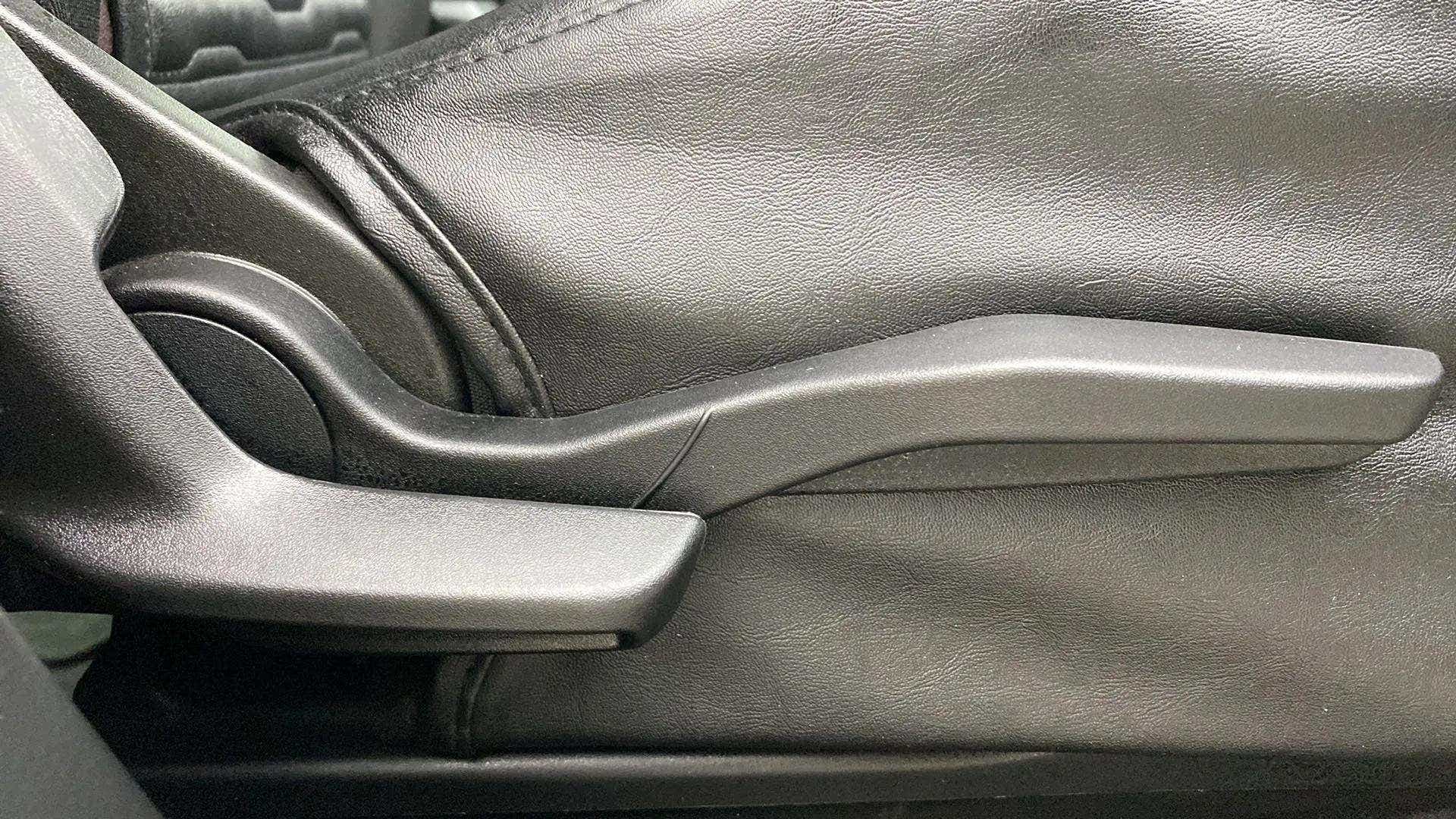 Close-up of the handbrake lever of a Maruti Suzuki Grand Vitara