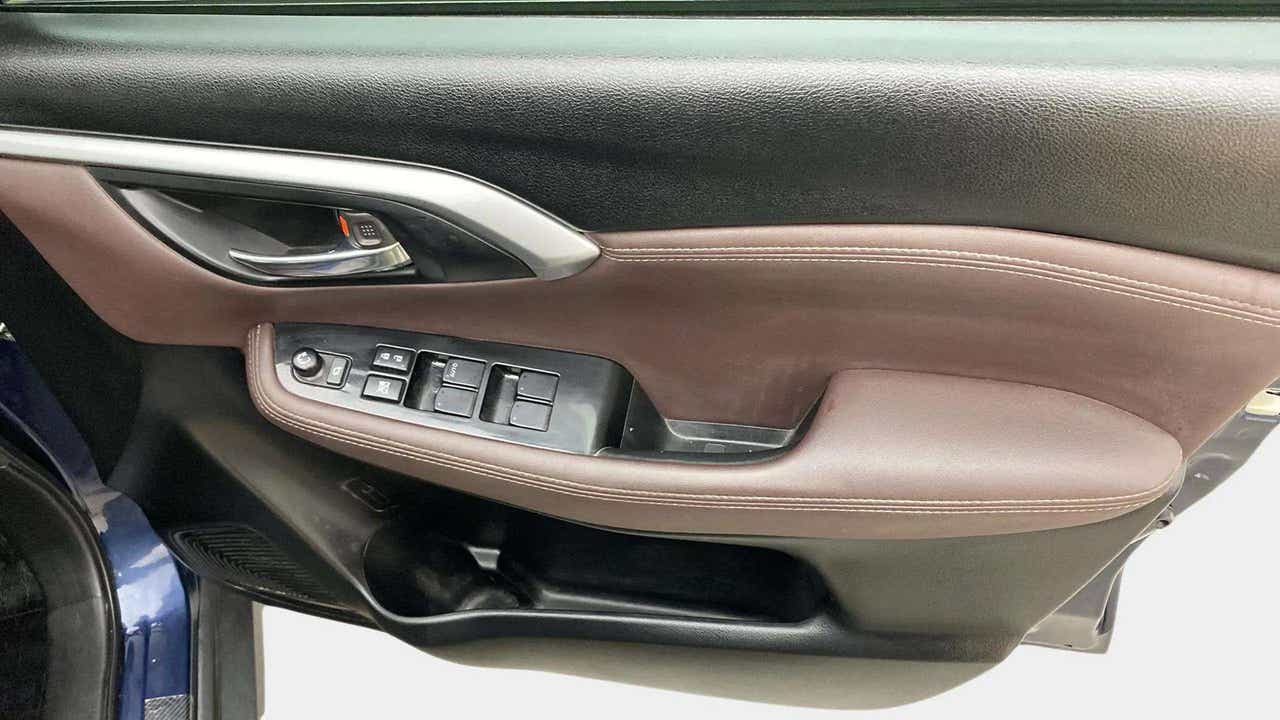 Interior driver side door panel of a Maruti Suzuki Grand Vitara