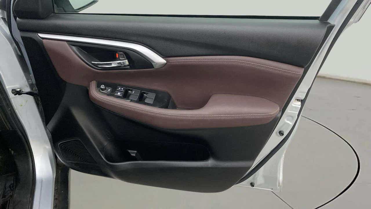 Interior driver side door panel of a Maruti Suzuki Grand Vitara