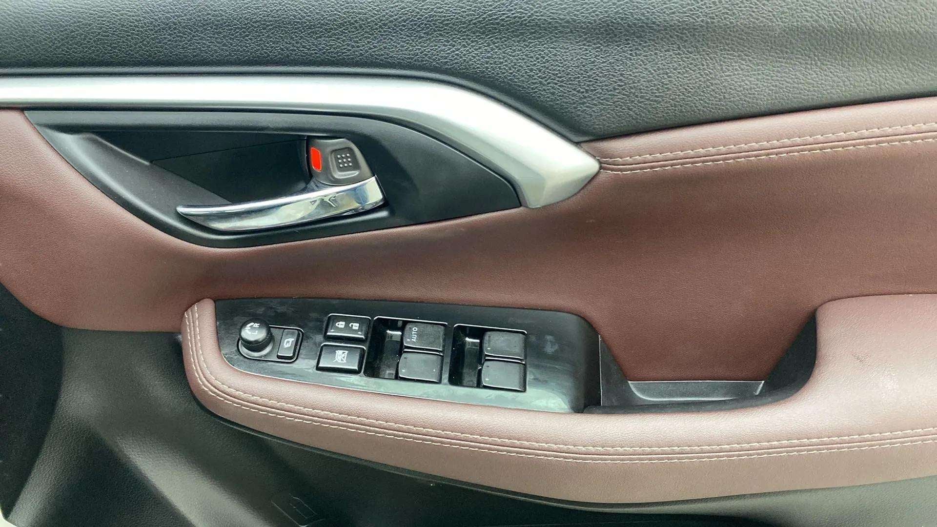 Door panel controls of a Maruti Suzuki Grand Vitara