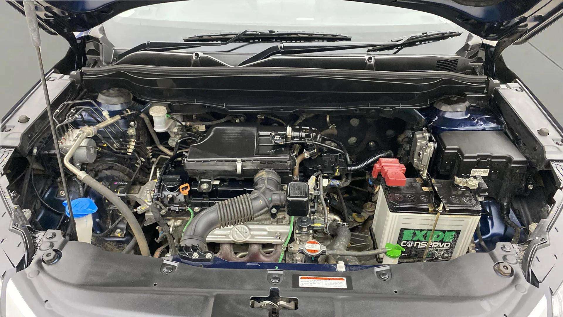 Engine bay view of a Maruti Suzuki Grand Vitara