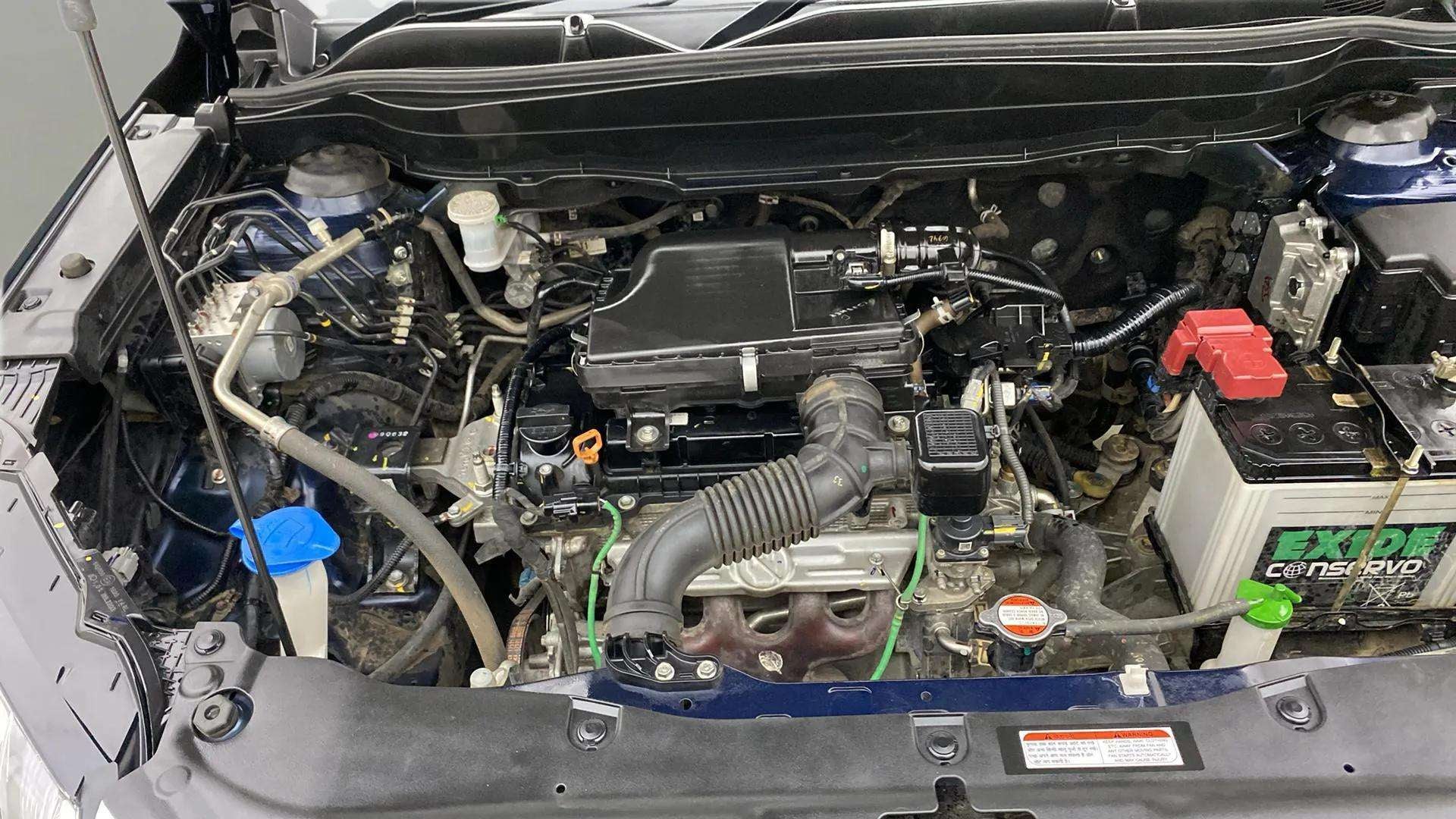 Engine bay of a Maruti Suzuki Grand Vitara