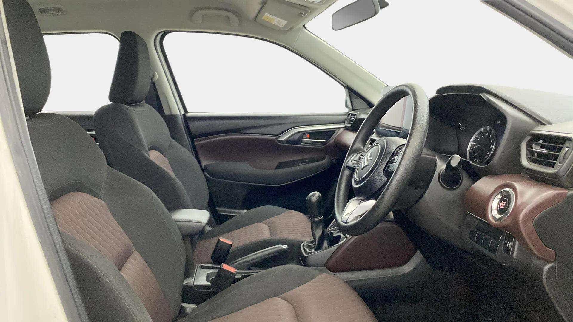 Interior front seats and dashboard of a Maruti Suzuki Grand Vitara