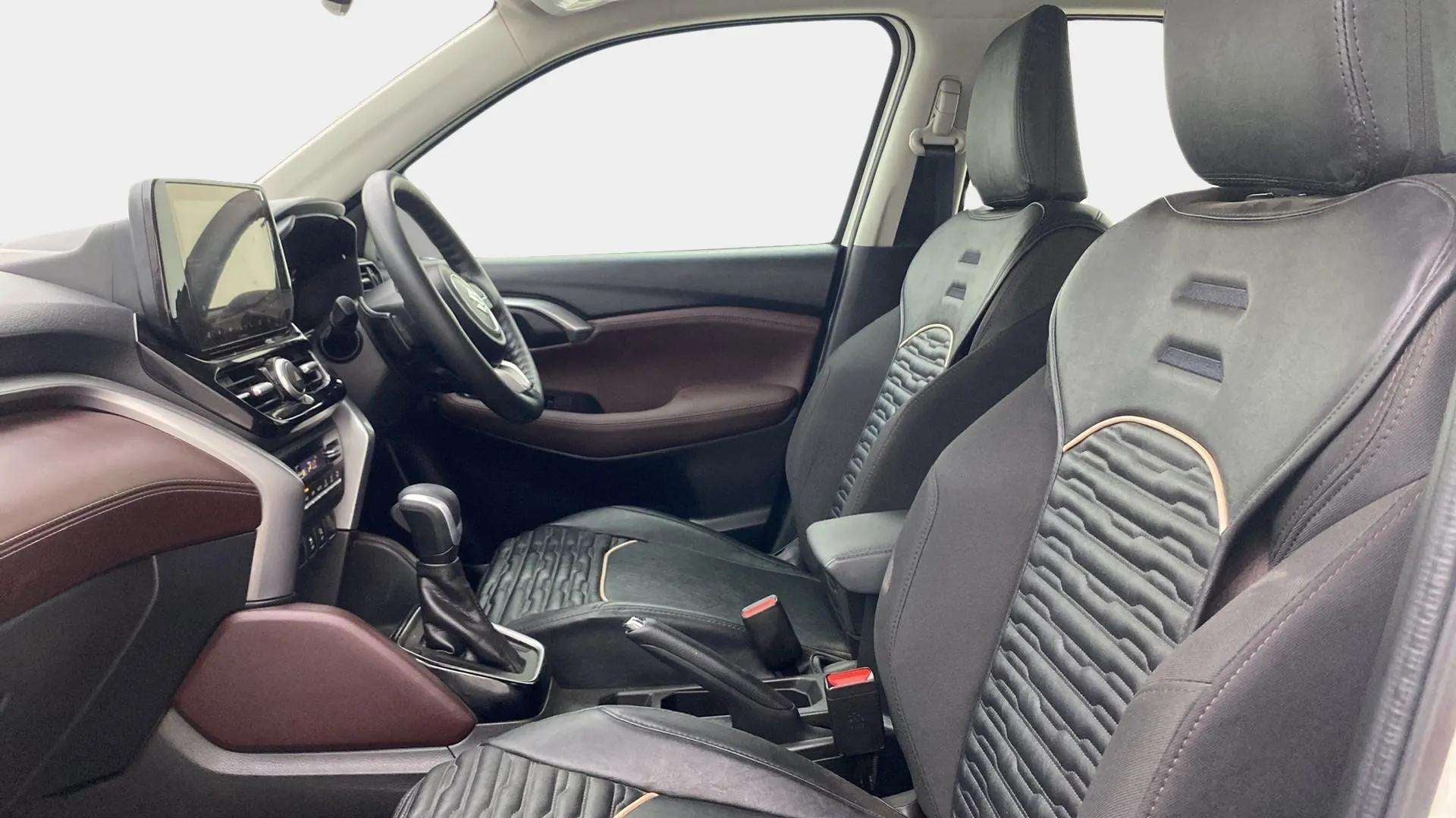 Interior dashboard and seats of a Maruti Suzuki Grand Vitara