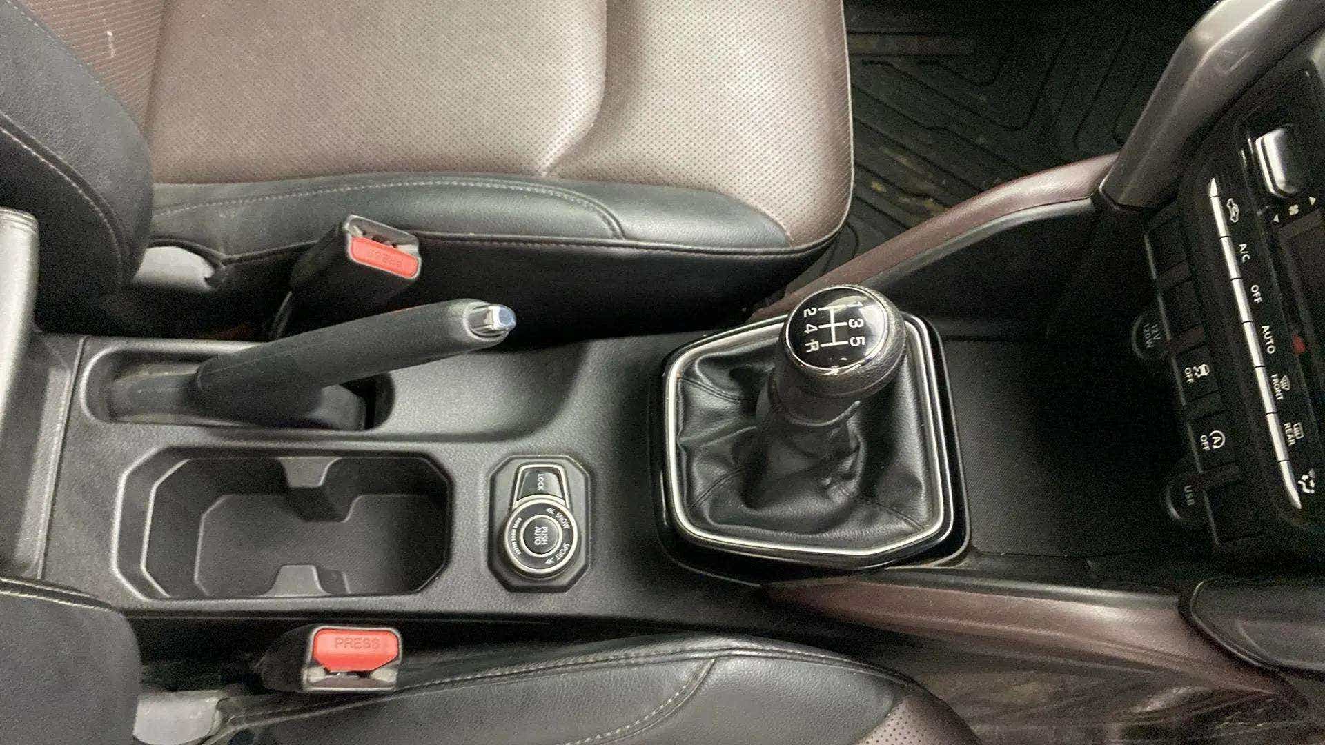 Gear lever and center console of a Maruti Suzuki Grand Vitara