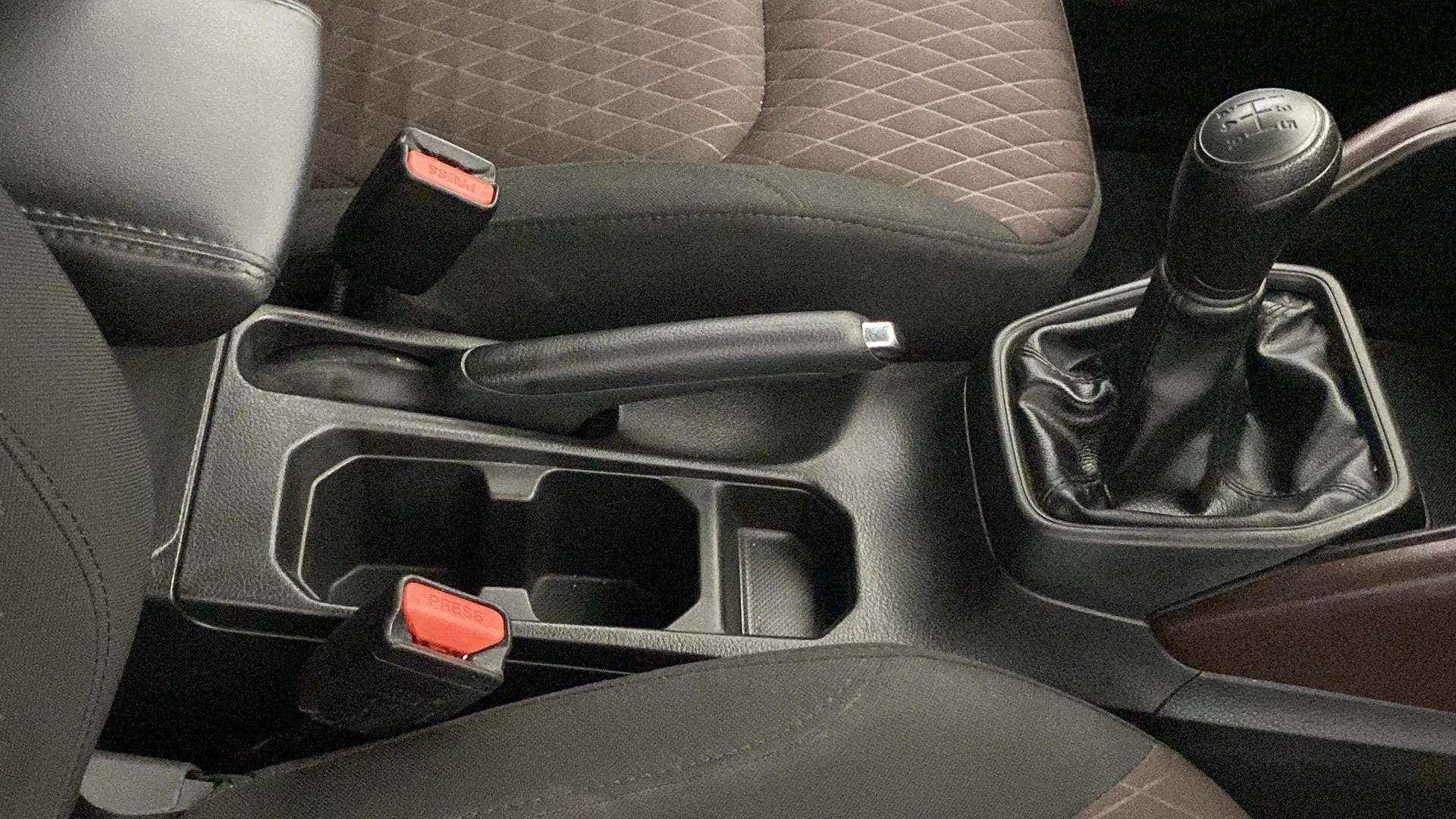Center console with handbrake and gear shifter of a Maruti Suzuki Grand Vitara