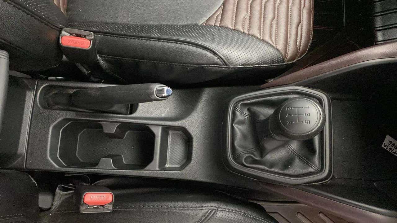 Center console with gear shifter and handbrake of a Maruti Suzuki Grand Vitara
