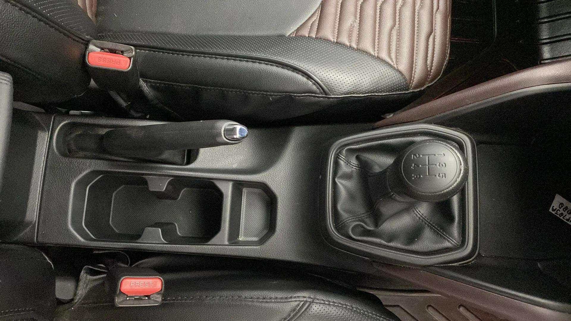 Center console with gear shifter and handbrake of a Maruti Suzuki Grand Vitara