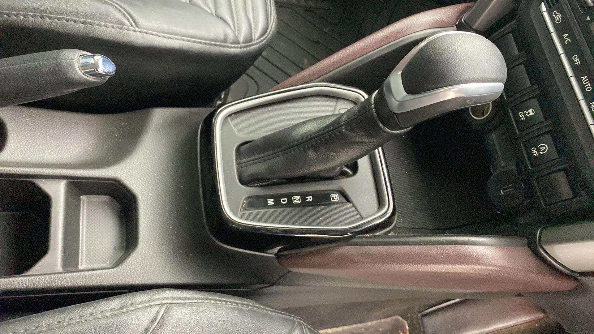 Gear lever area of a Maruti Suzuki Grand Vitara