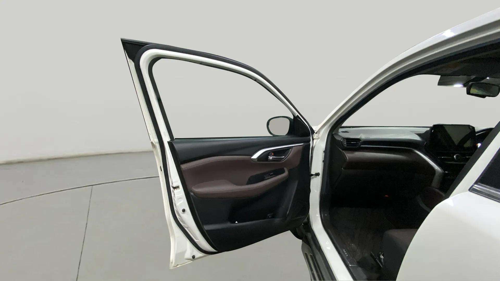 Front passenger door open view of a Maruti Suzuki Grand Vitara