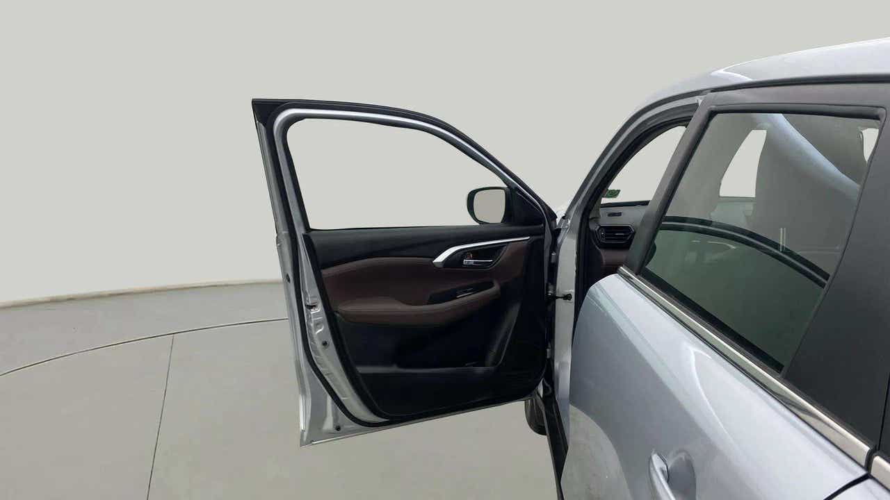 Front left door open view of a Maruti Suzuki Grand Vitara
